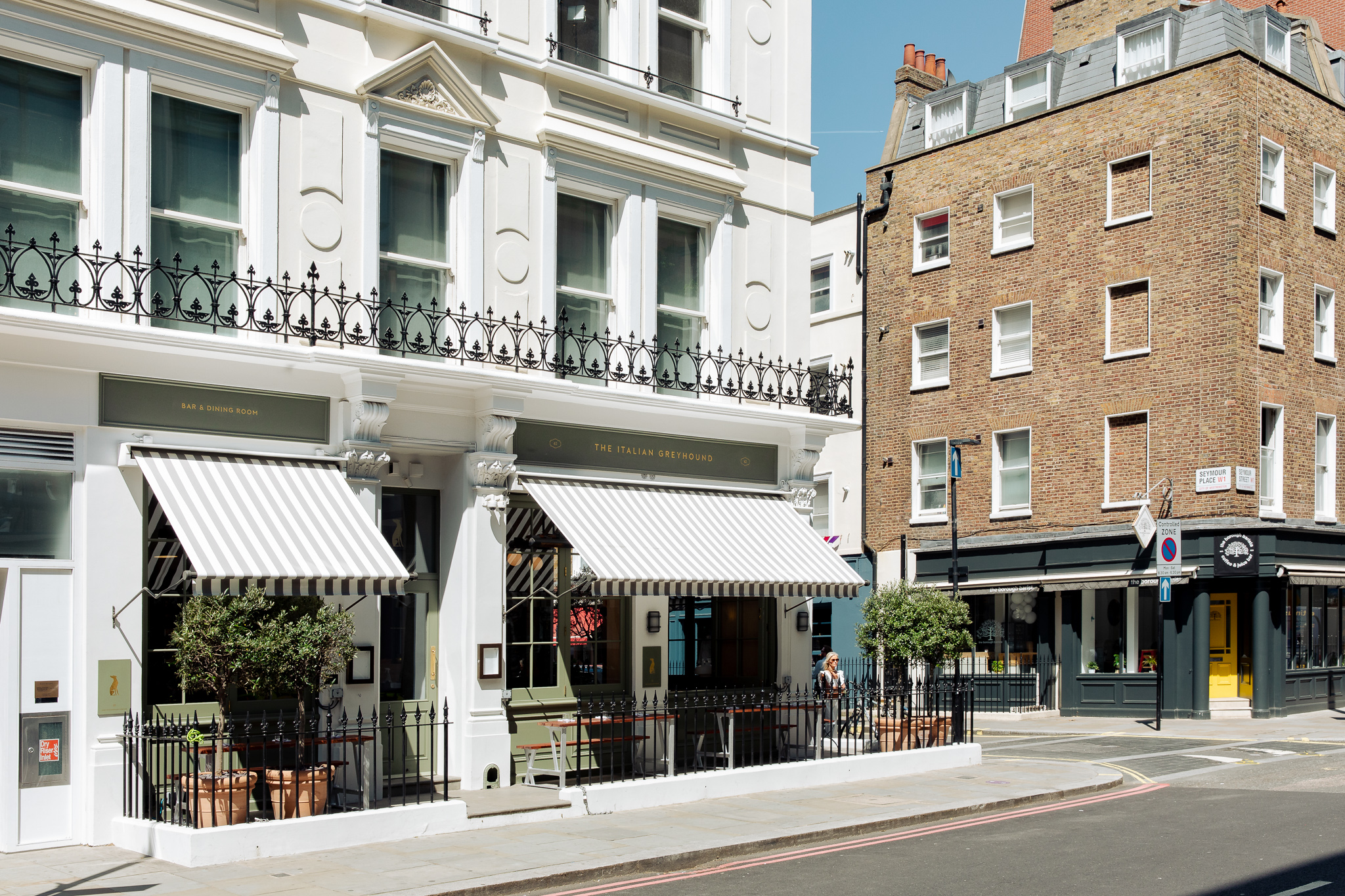 Charming outdoor seating at The Garden Room, ideal for casual meetings and networking events.