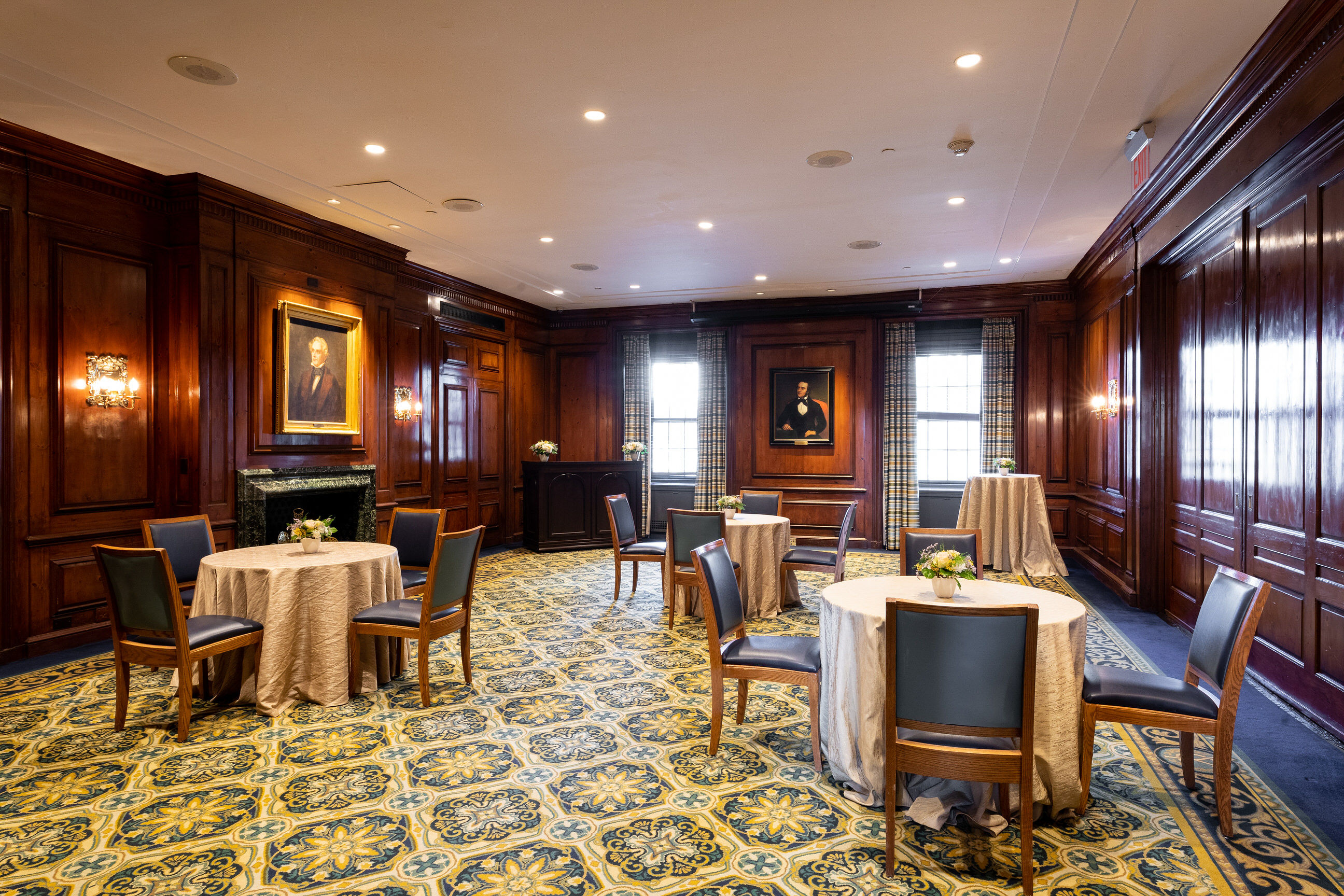 Saybrook room at Yale Club: elegant meeting space with round tables, ideal for networking events.