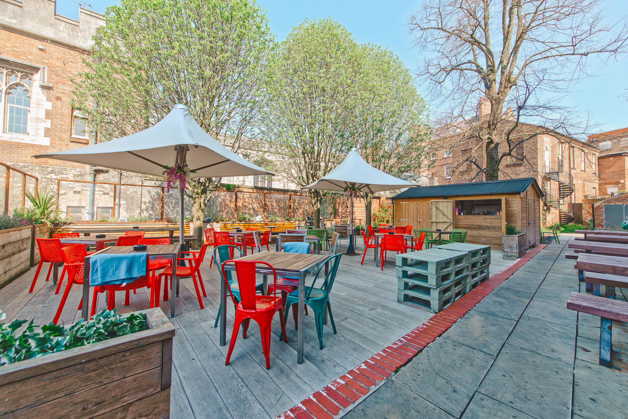 Vibrant outdoor event space at Revolution York, perfect for summer gatherings and networking.