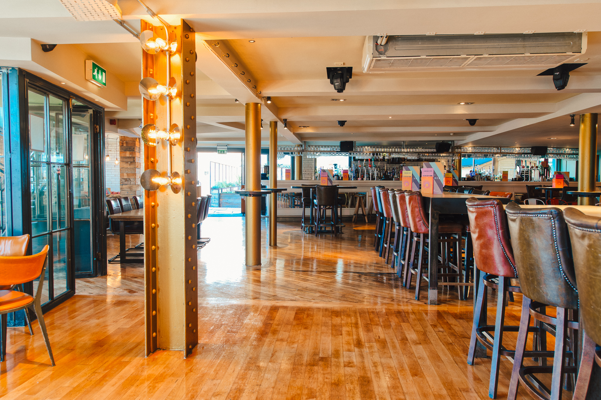 Spacious venue hire in Revolution York, ideal for events with stylish bar and natural light.