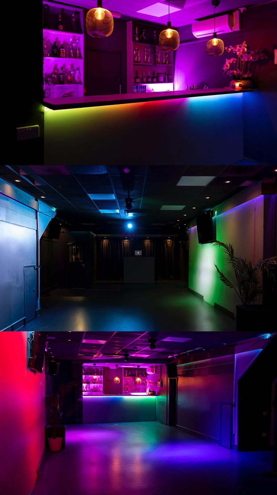 Versatile event space with dynamic lighting for corporate meetings and social gatherings.