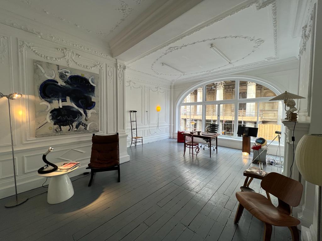 Elegant event space on Saint George Street with large windows for meetings and workshops.