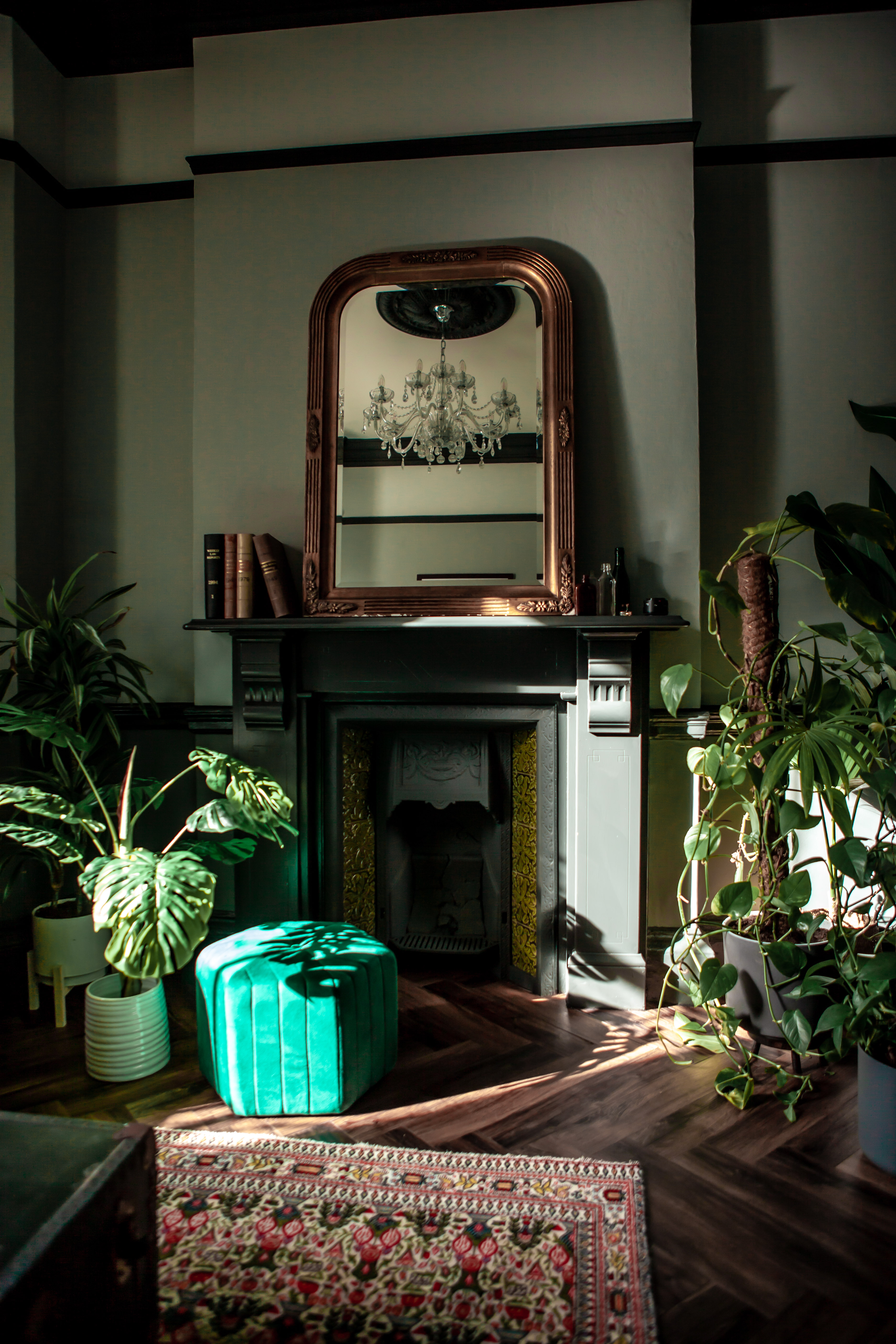 Elegant Board Room with fireplace and greenery, perfect for intimate gatherings.