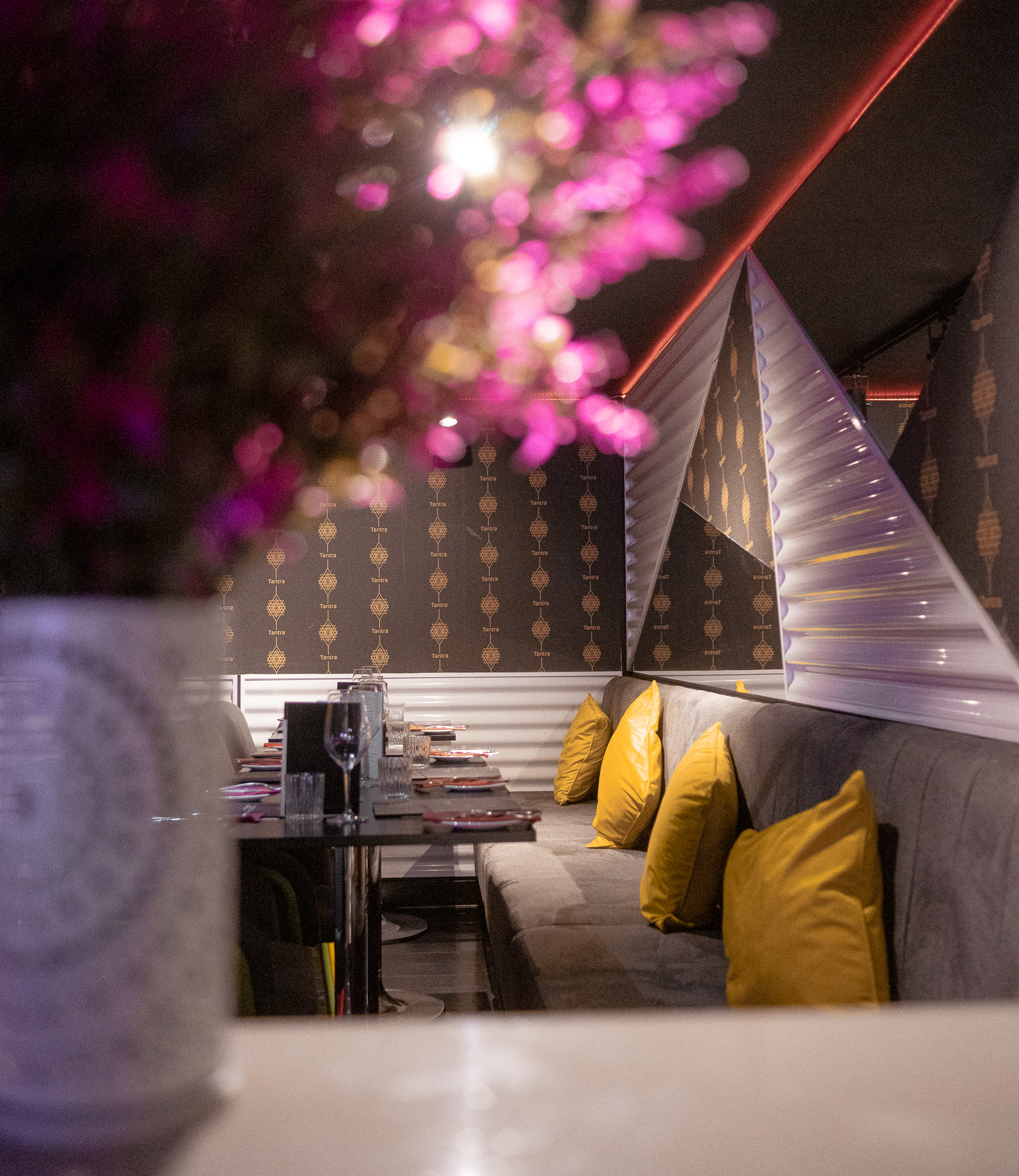 Tantra Private Dining Room in Edinburgh, featuring vibrant yellow cushions for intimate events.