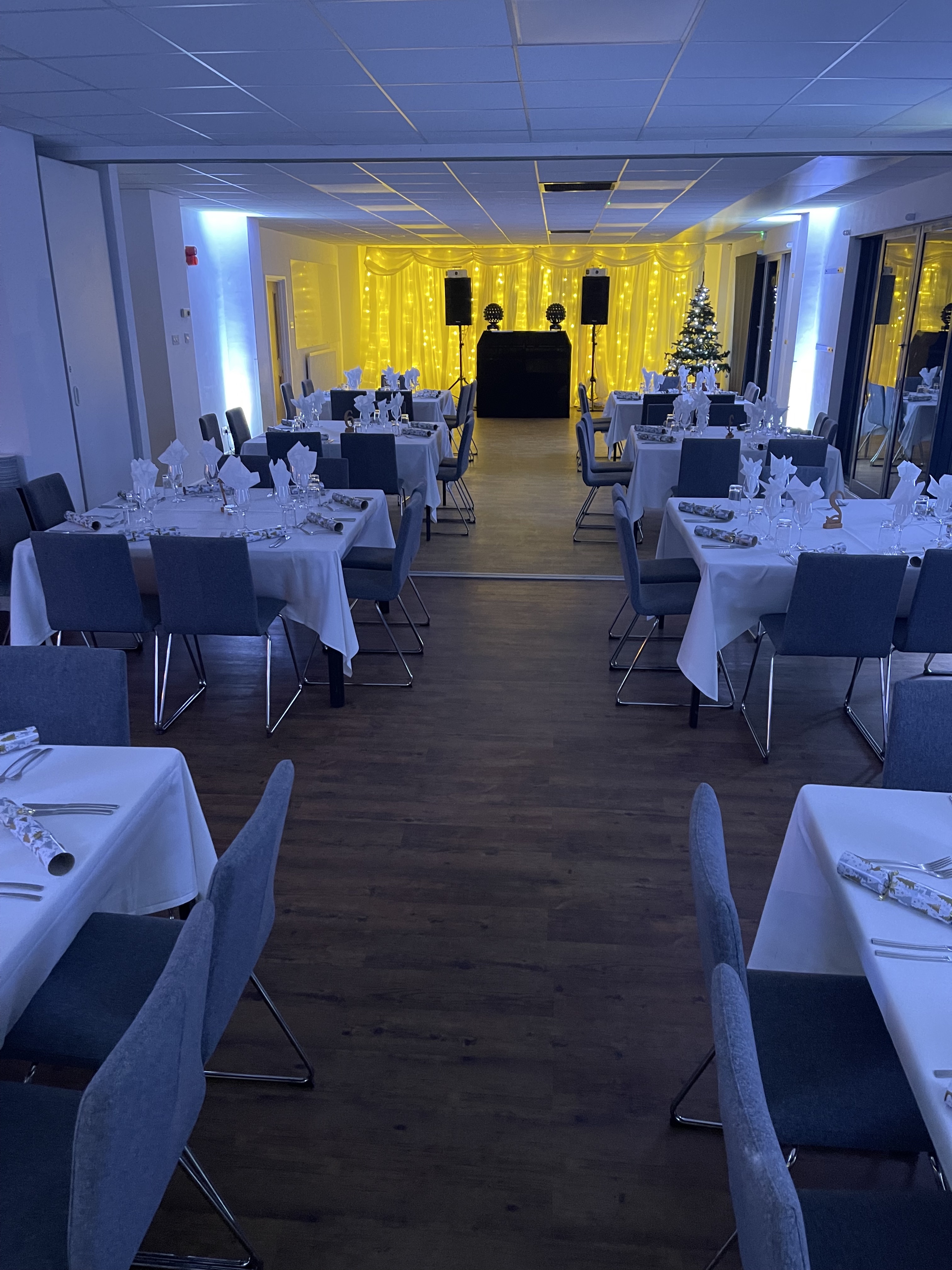 Elegant Waterside Suite set for formal dinner, perfect for corporate events and weddings.