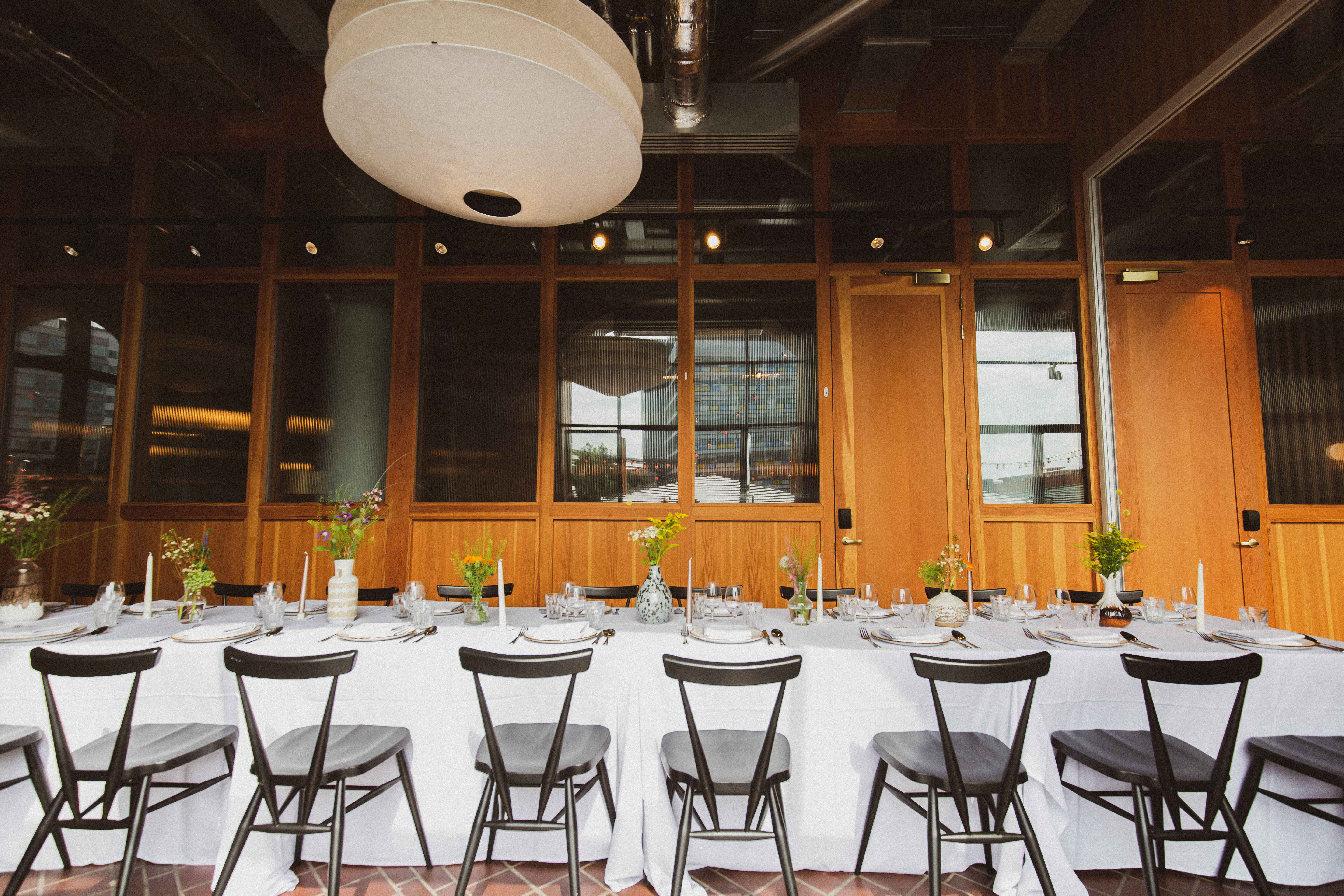 Elegant dining setup in Ducie Street Warehouse for corporate events and gatherings.
