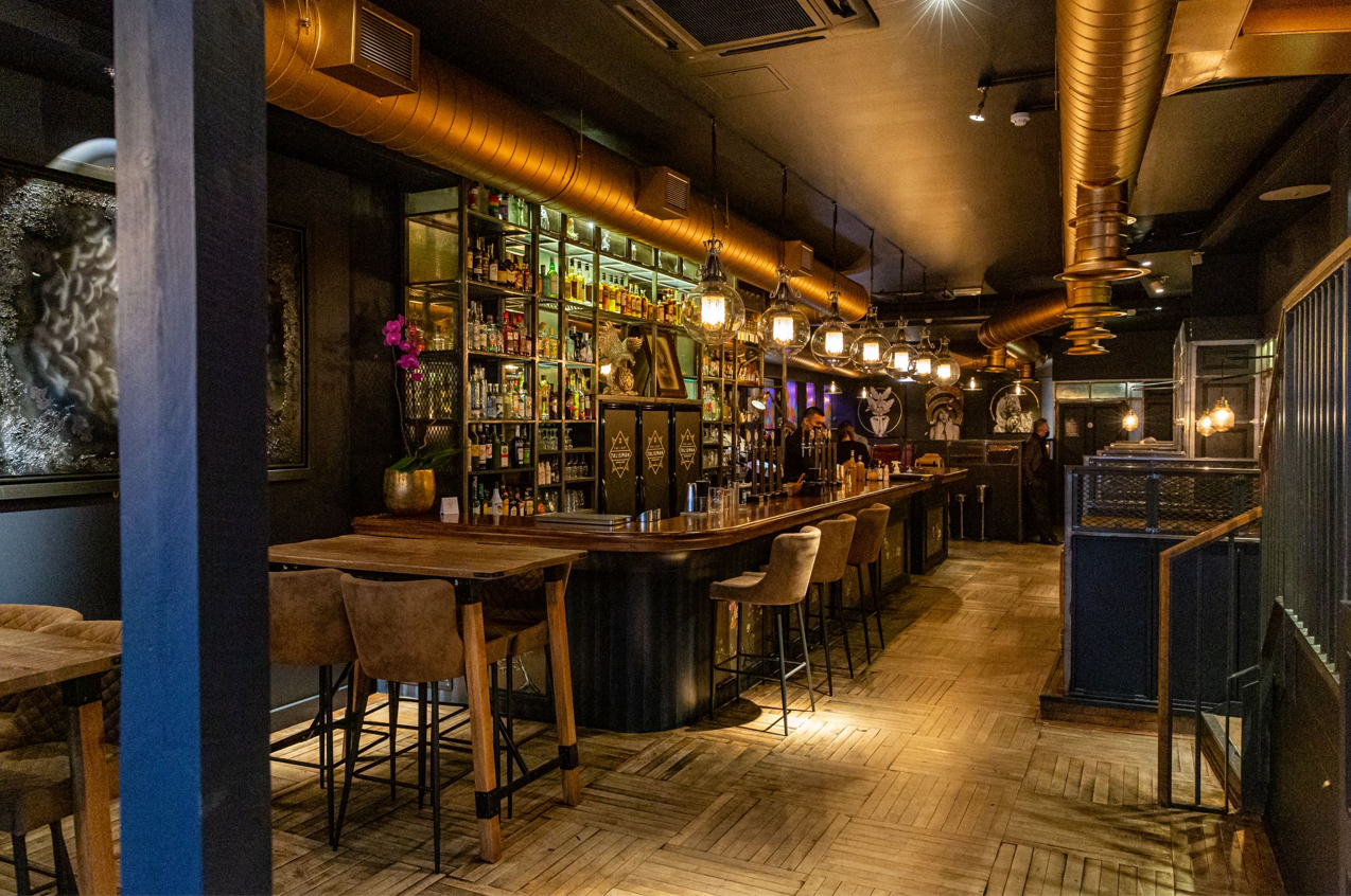 Stylish bar area at The Last Talisman, ideal for networking events and private gatherings.