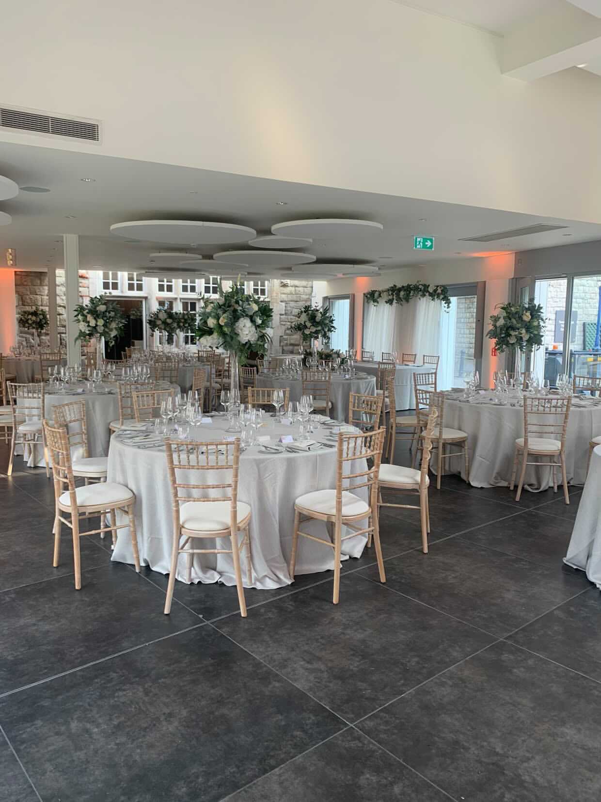 Elegant event space at Tower of London with round tables, ideal for weddings and corporate events.