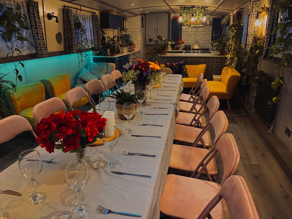 Elegant dining setup with floral centerpieces for intimate dinner parties in Xenia.