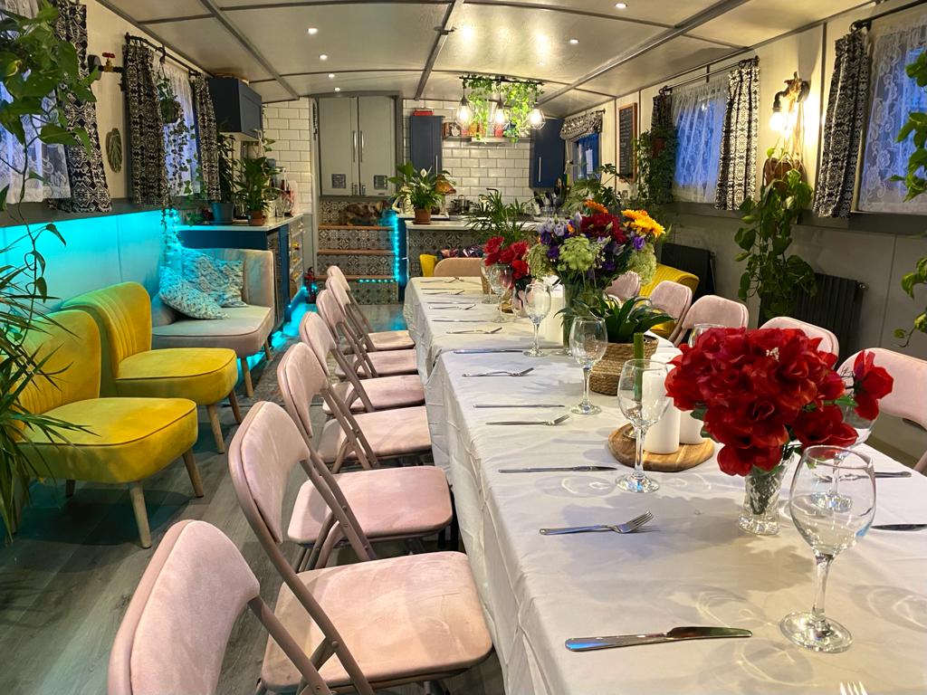 Elegant dining setup with floral centerpieces for intimate gatherings in Xenia.