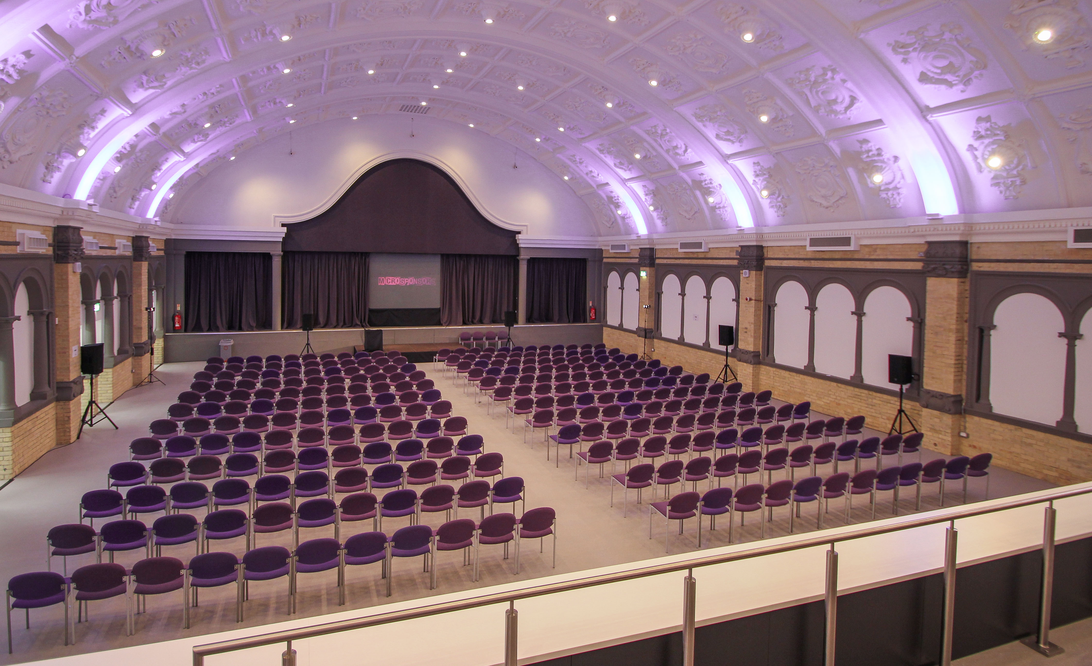 Great Hall at London Metropolitan University, theater-style seating for conferences.