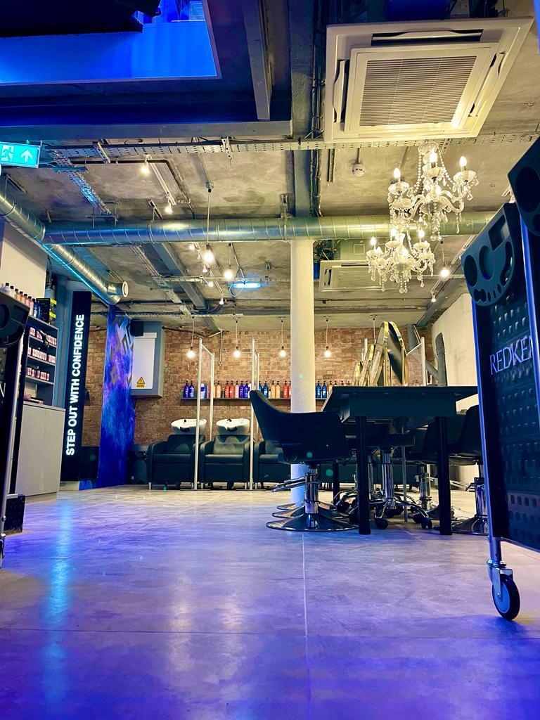 Modern event space with exposed brick for workshops and beauty events in Soho.