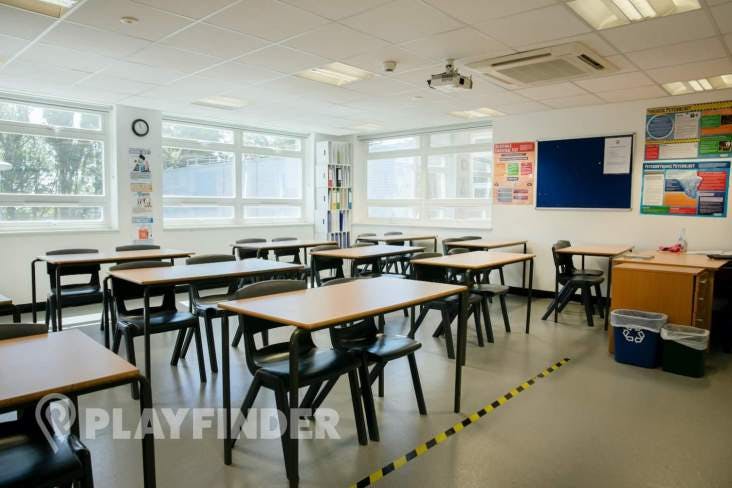 Versatile meeting room at St Aloysius' College with natural light for workshops and training.