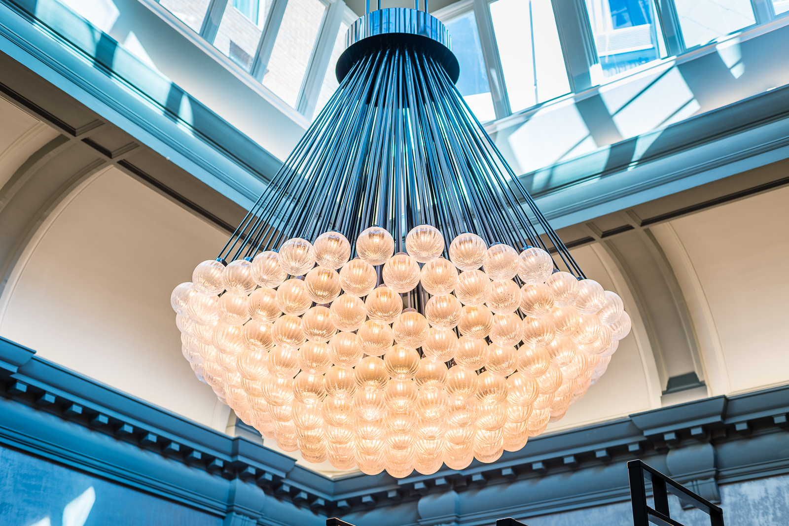 Courtroom Bar chandelier at The Dixon, Tower Bridge, ideal for upscale events and gatherings.