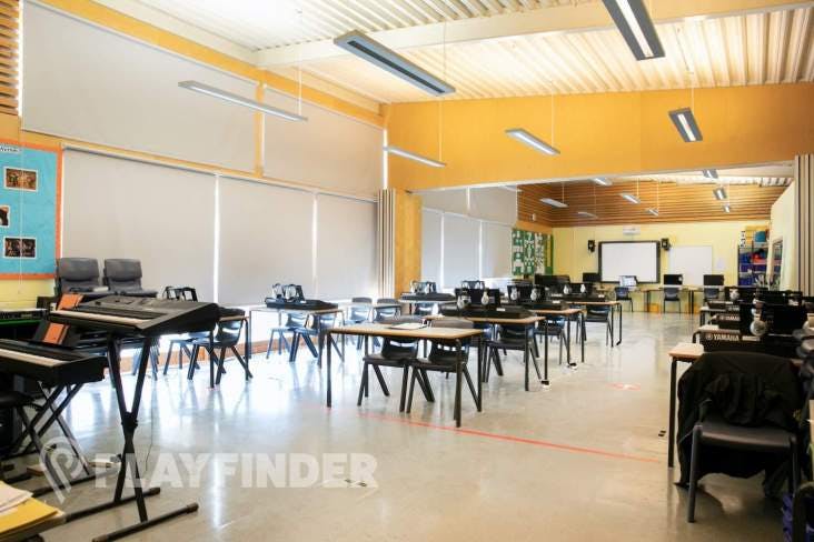 Versatile music room with natural light for workshops and meetings at St Aloysius' College.