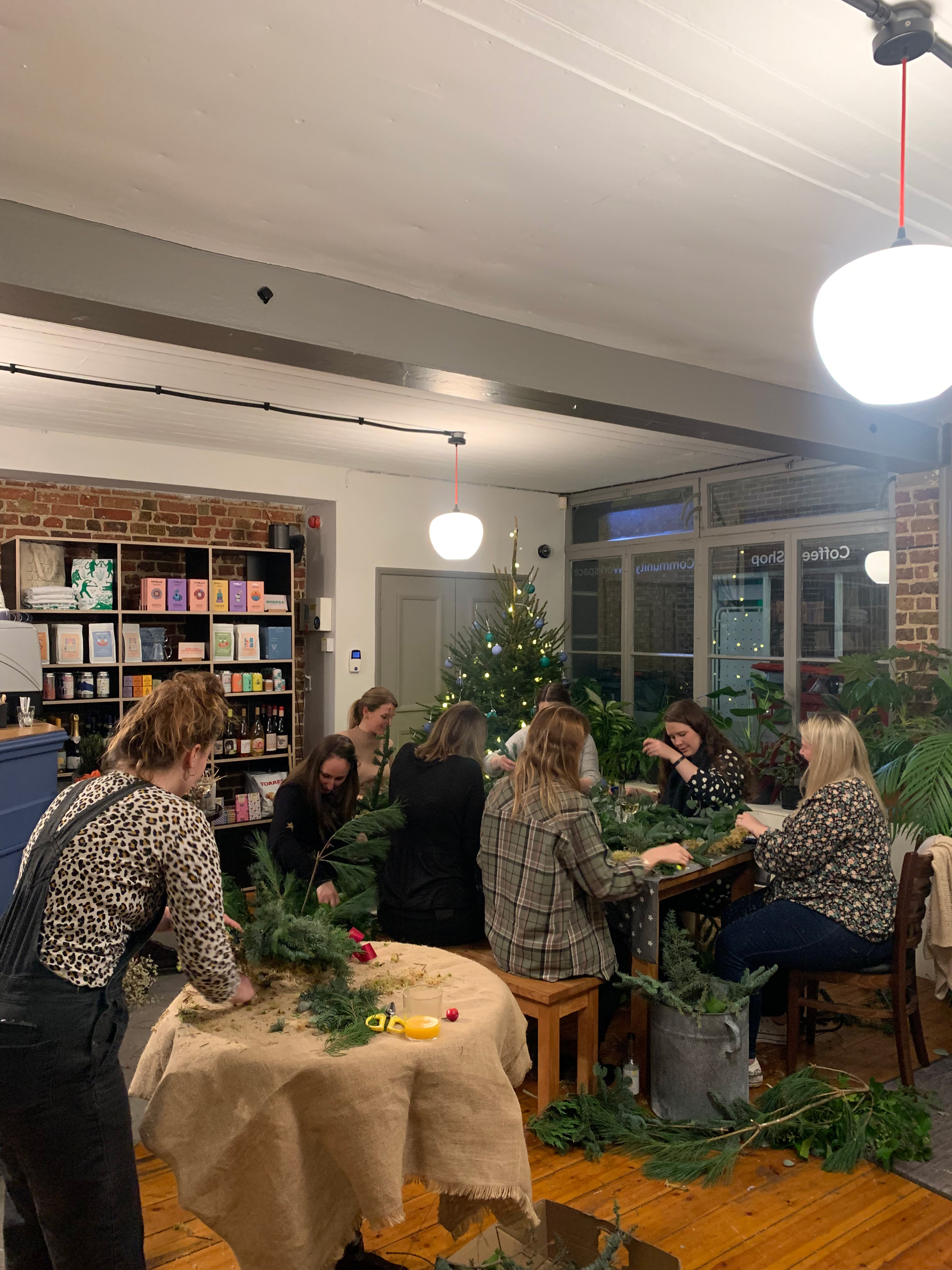 Cozy workshop at Bodega Eastbourne for holiday decoration team-building event.