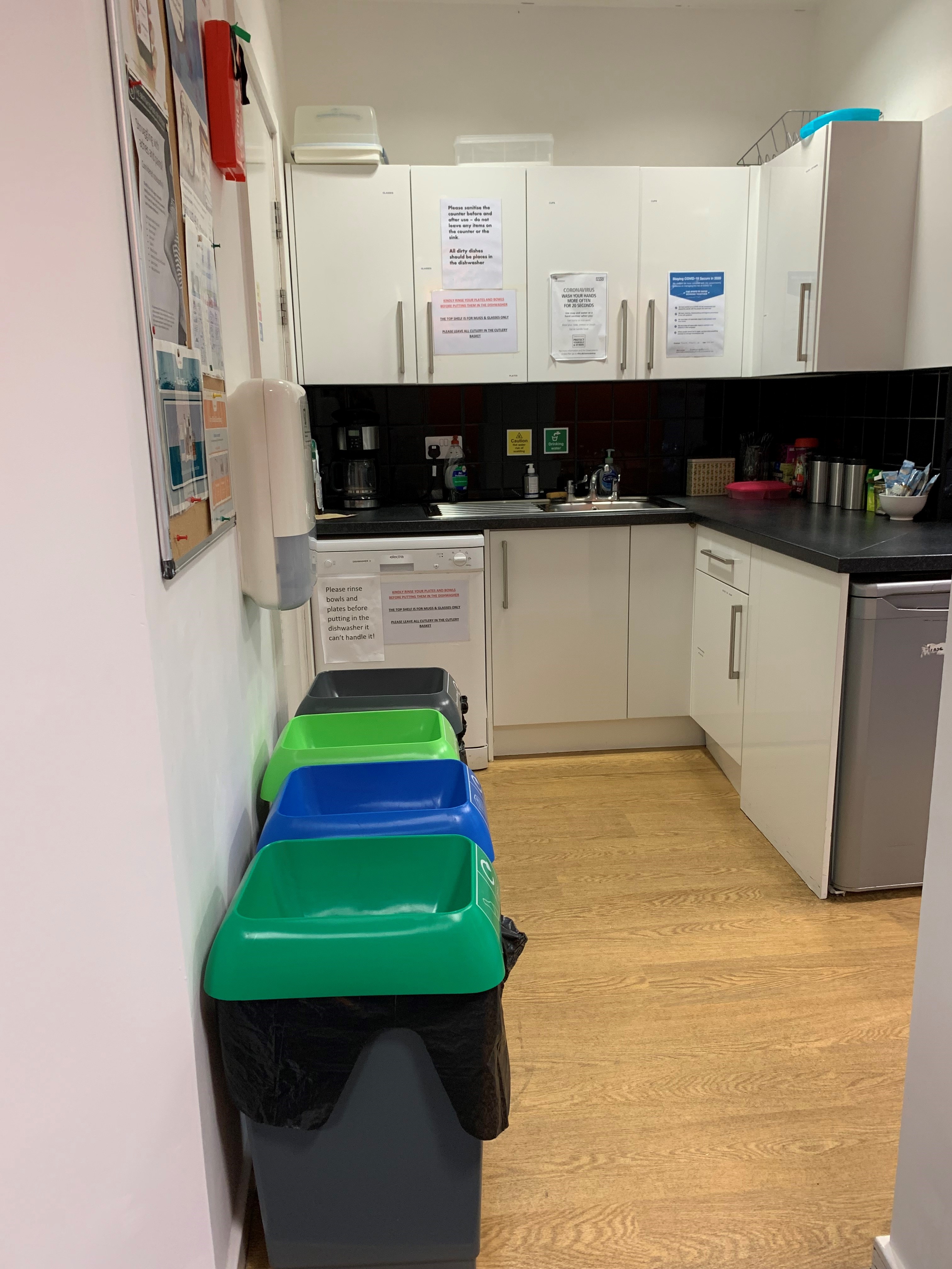 MDUK office kitchen with recycling bins, promoting sustainability for meetings and events.