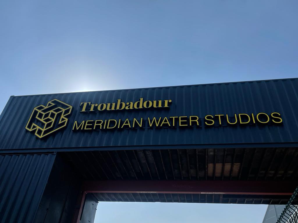 Modern entrance of Troubadour Meridian Water Studios for creative events and meetings.