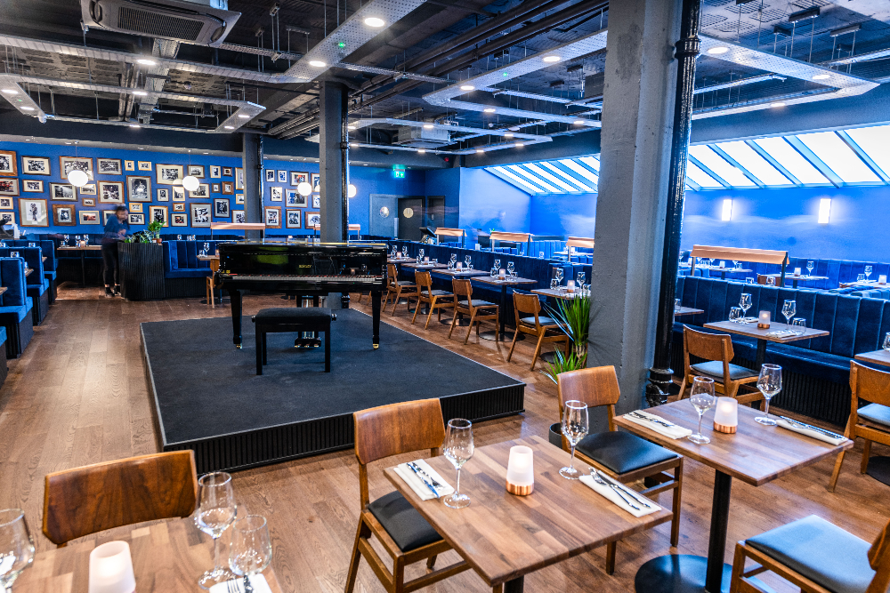Troubadour Wembley Park Theatre with grand piano, ideal for live performances and events.
