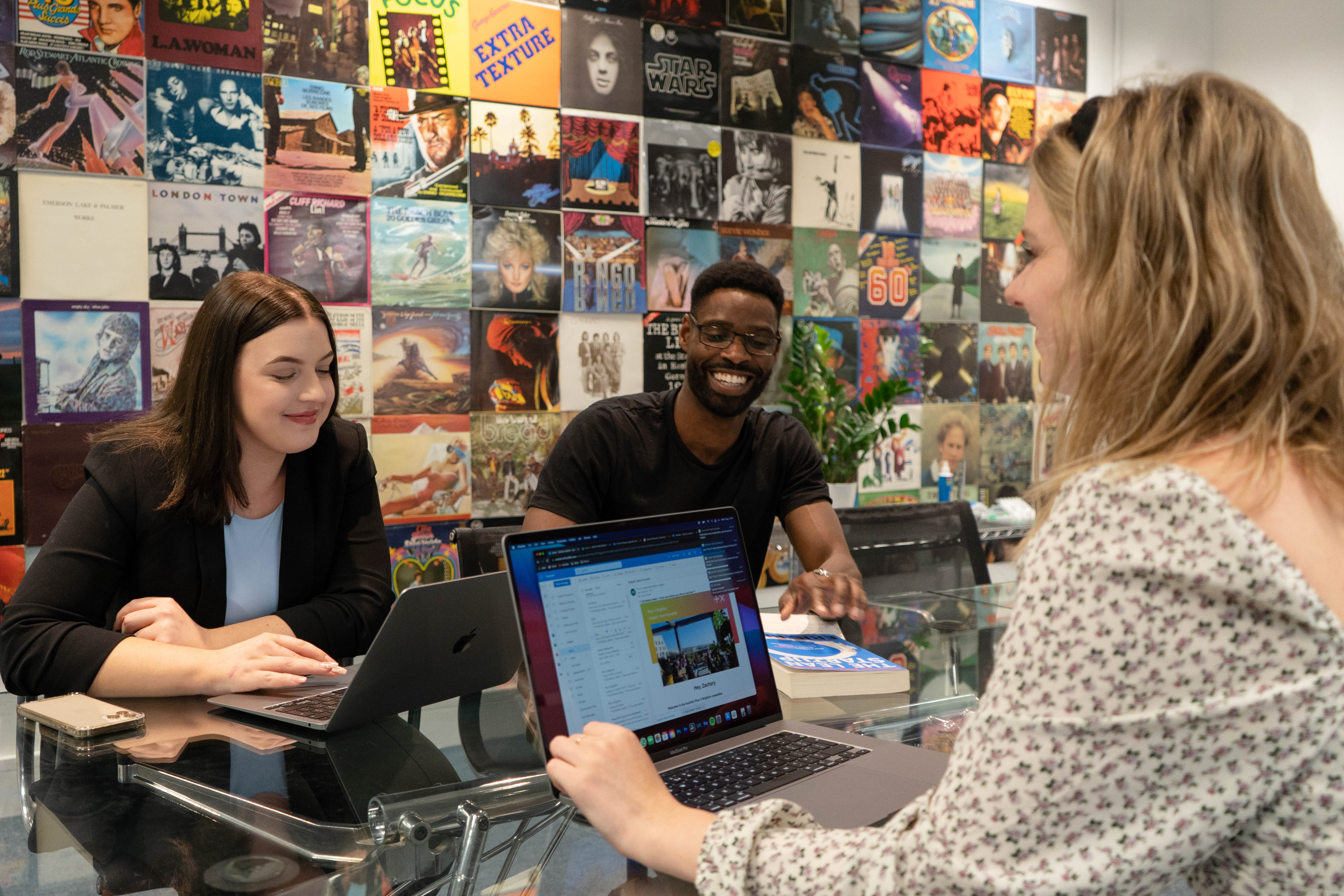 Collaborative meeting room with vinyl records, ideal for brainstorming events.