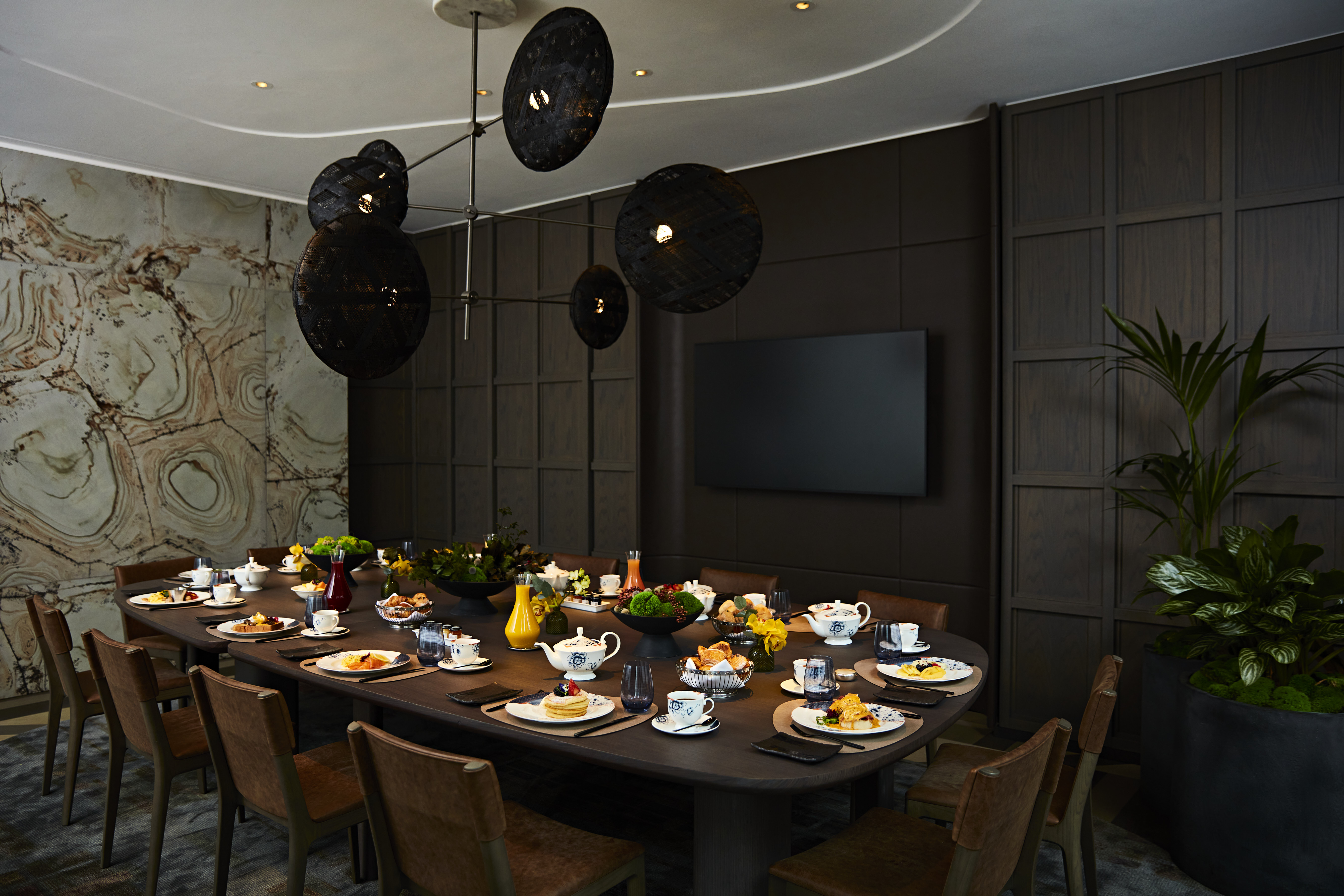 Katong private dining room set for a gourmet breakfast networking event.