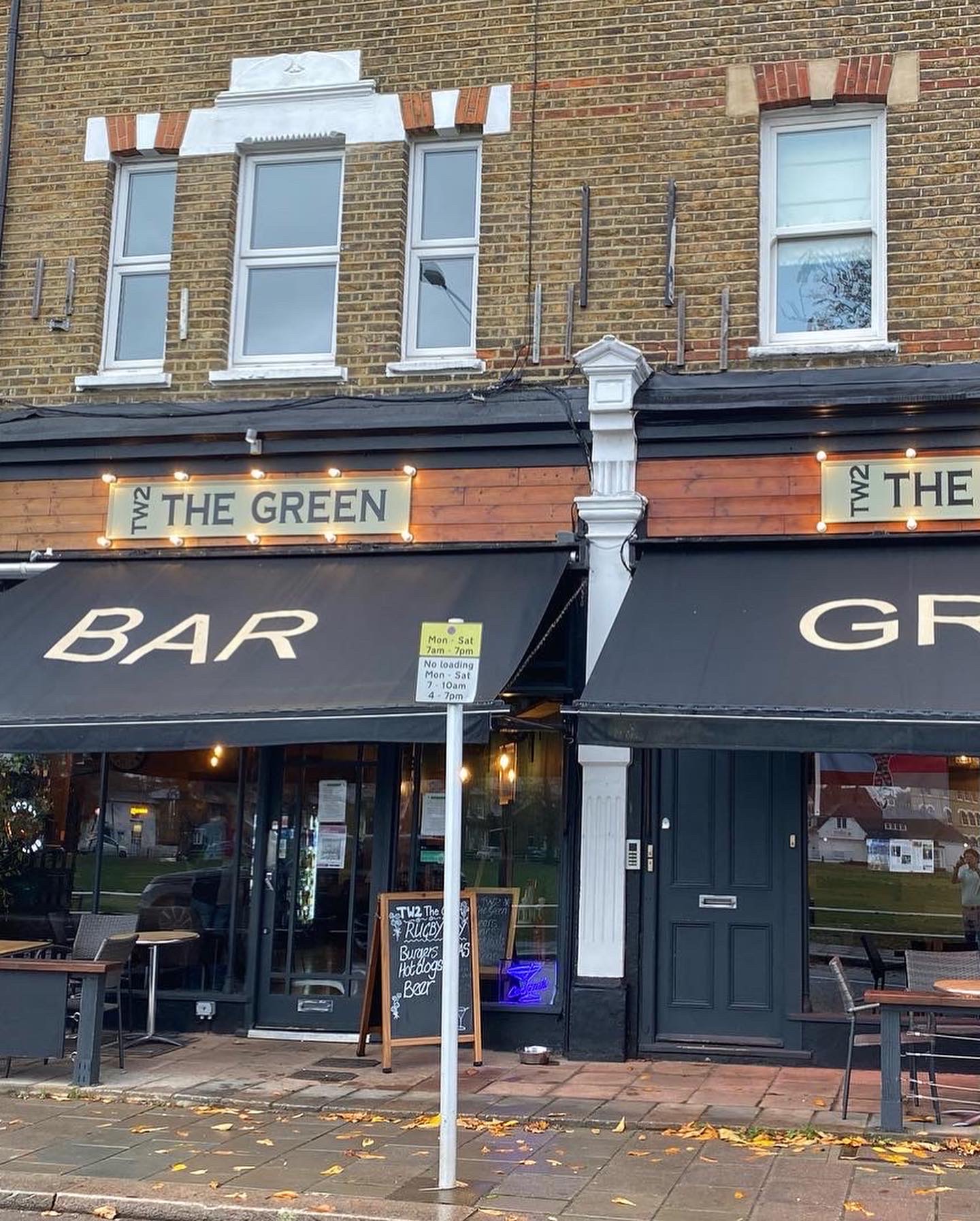 Charming bar and grill venue with outdoor seating for casual meetings and social events.