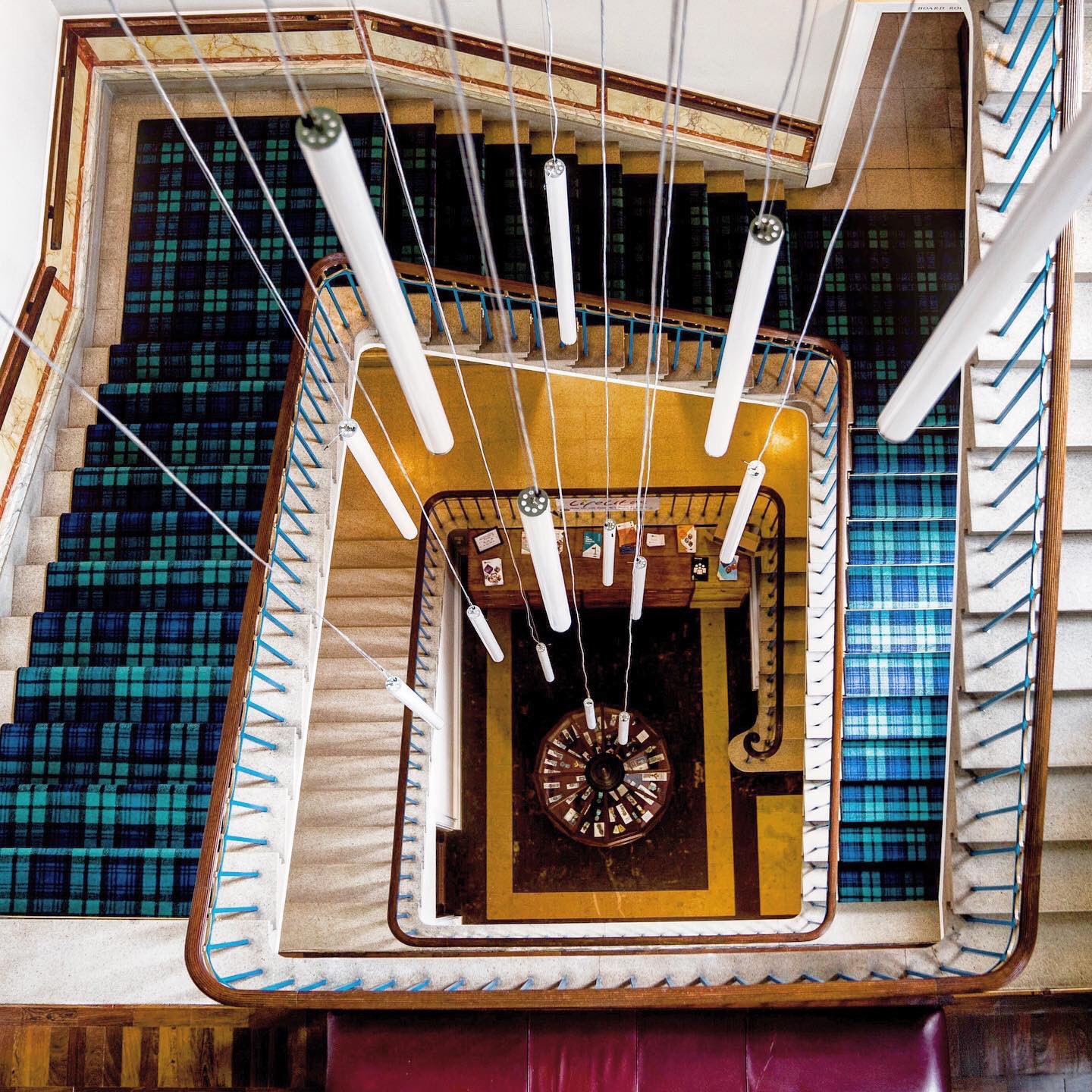 Elegant dining room with tartan carpet staircase, perfect for networking events and receptions.