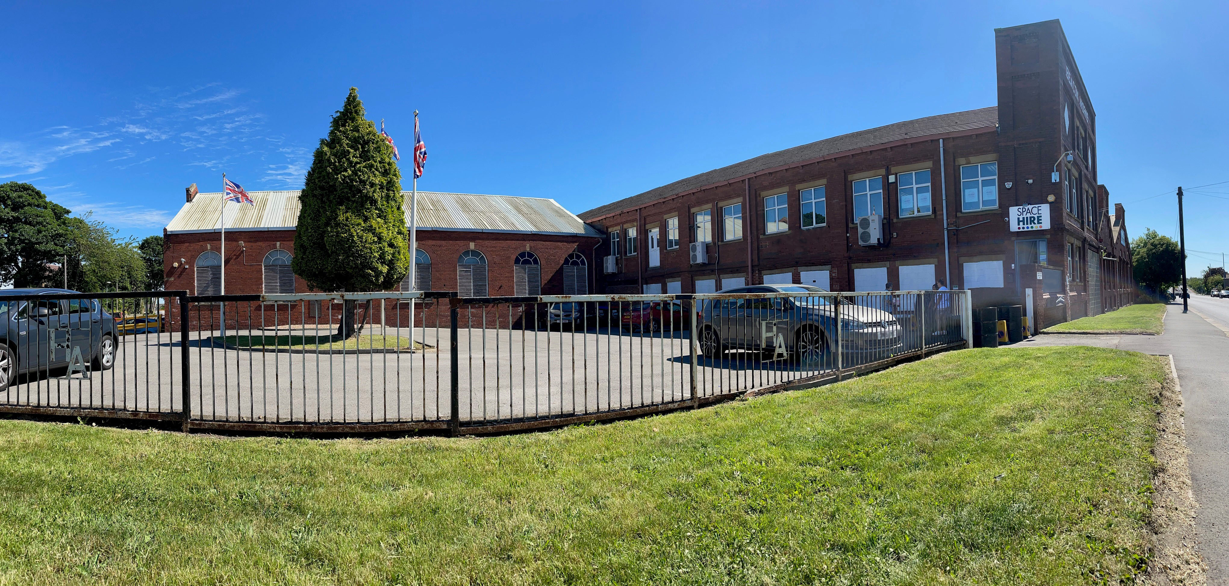 Versatile event venue with outdoor space and welcoming facade for gatherings.