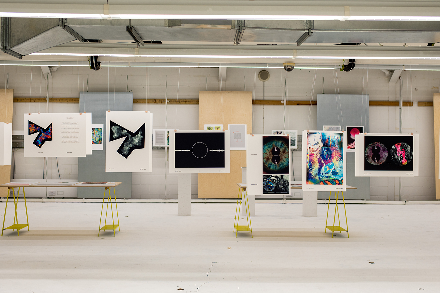 Modern exhibition space with vibrant artwork, ideal for art showcases and networking events.