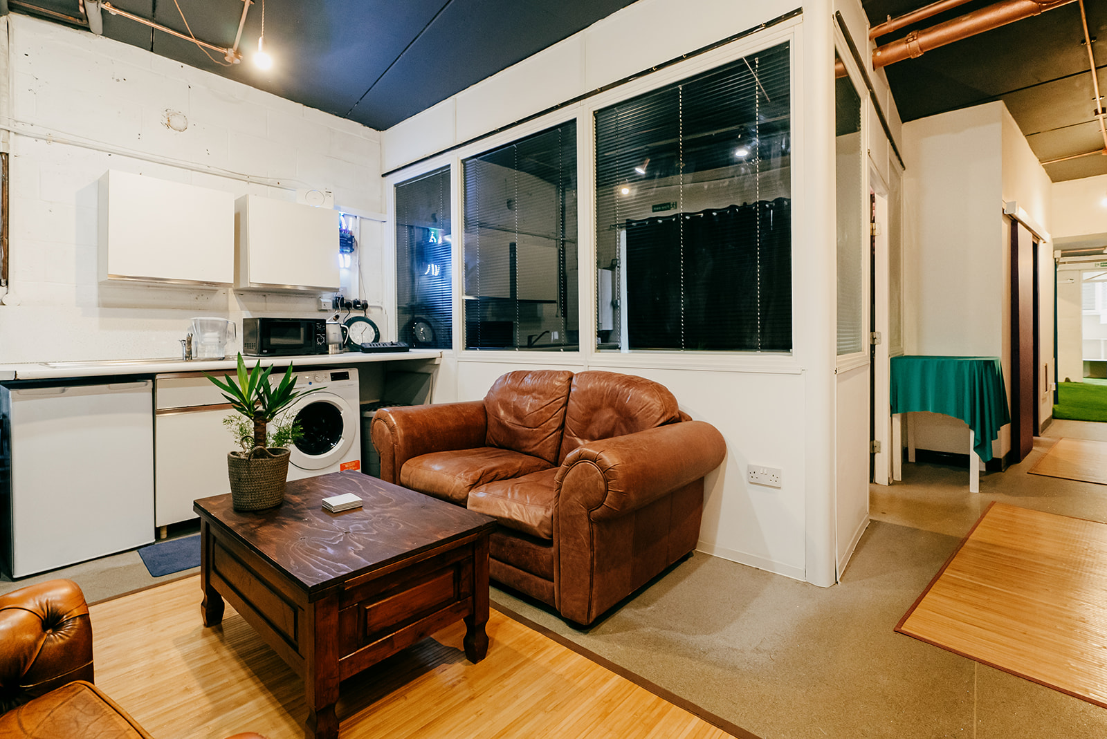 Cozy Blake Studios space with seating for informal meetings and team-building activities.