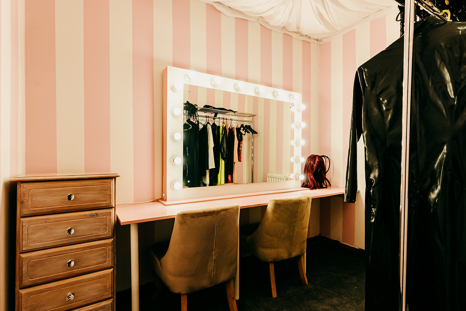 Stylish dressing room at Blake Studios with illuminated mirror for events and performances.