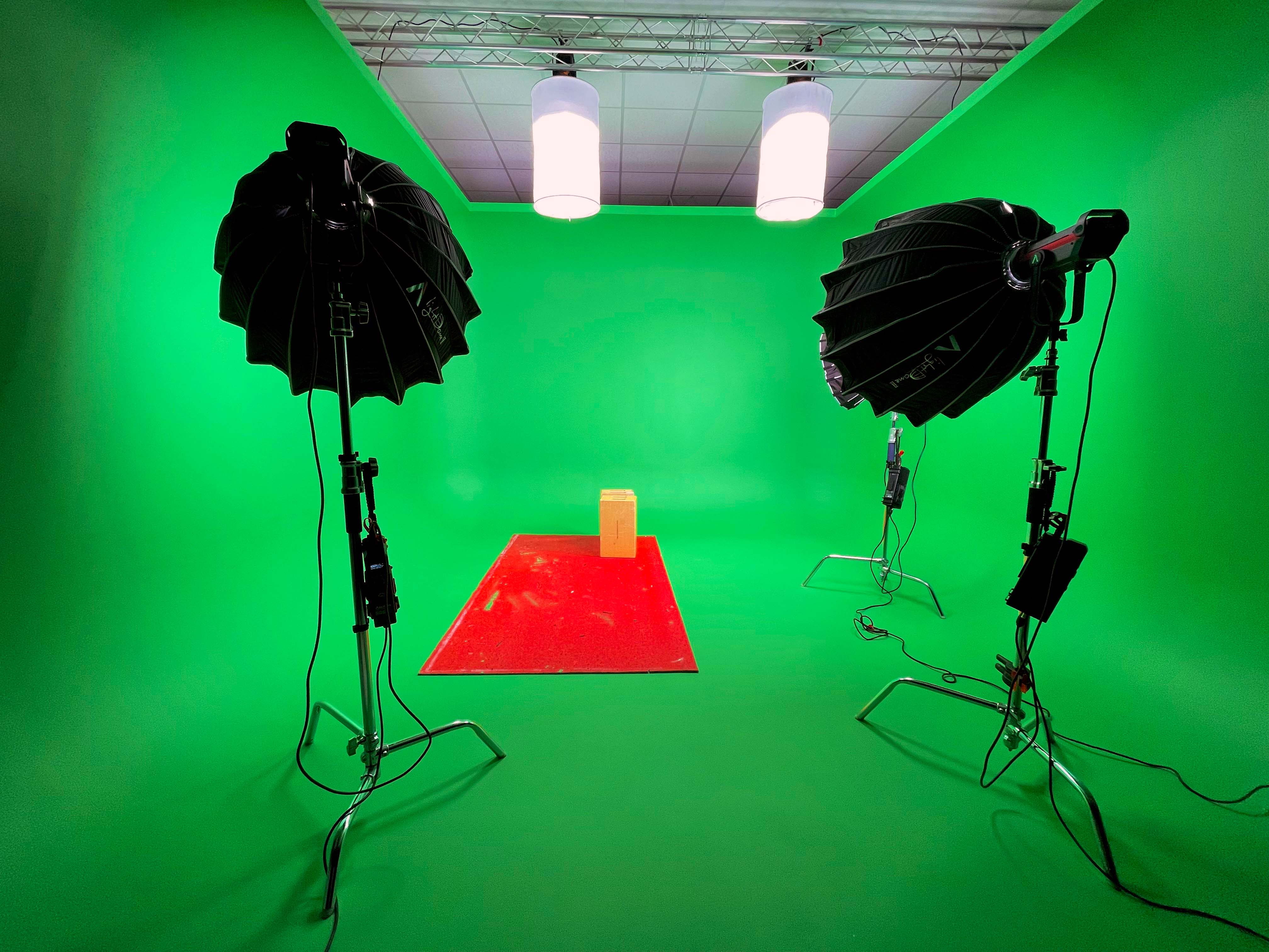 Green screen studio setup for virtual events and video production at Summer Isle Studios.