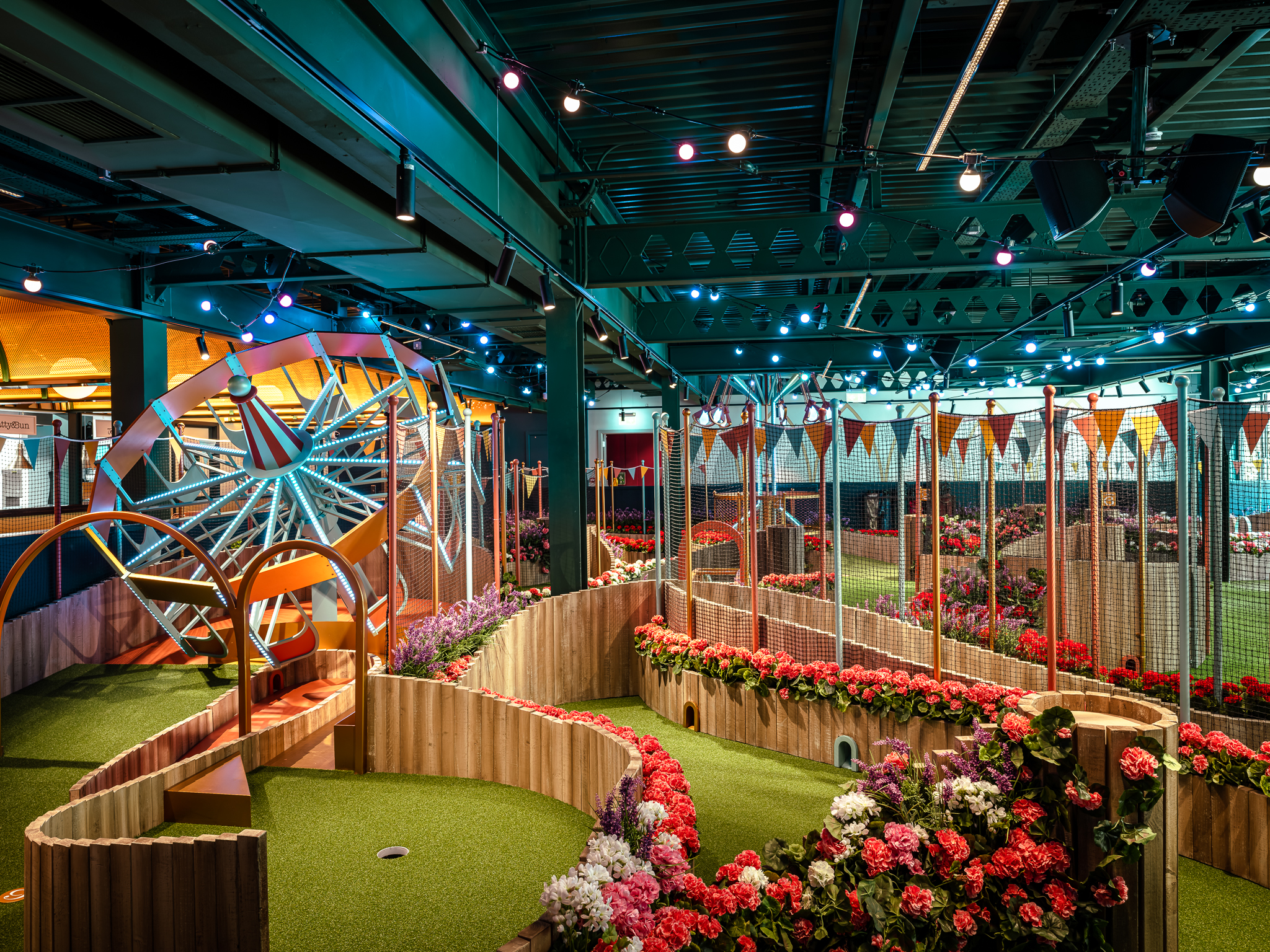 Vibrant Boathouse event space with colorful decor for team-building activities.