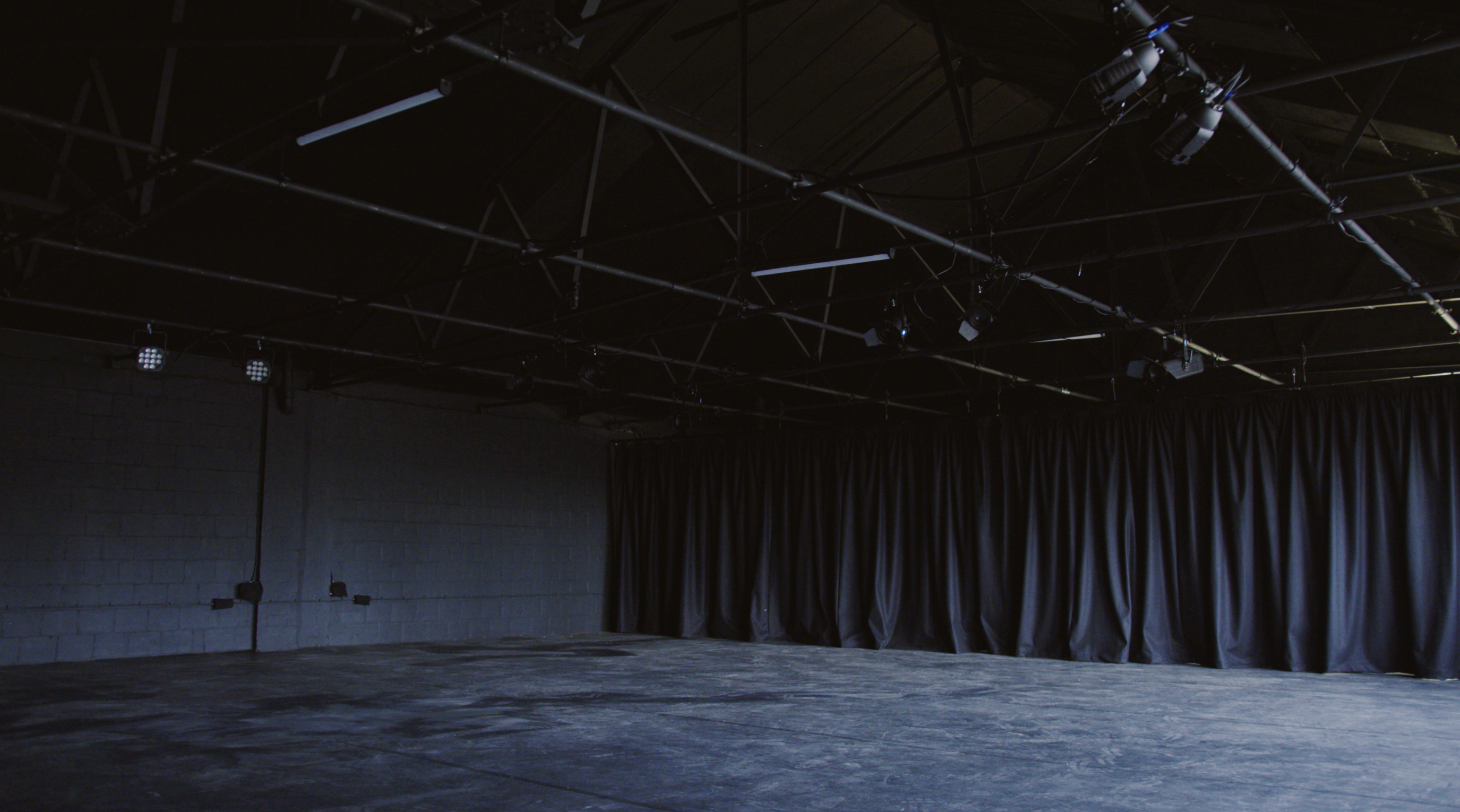 Versatile minimalist event space with high ceilings at Klatch Studio's Black Box.