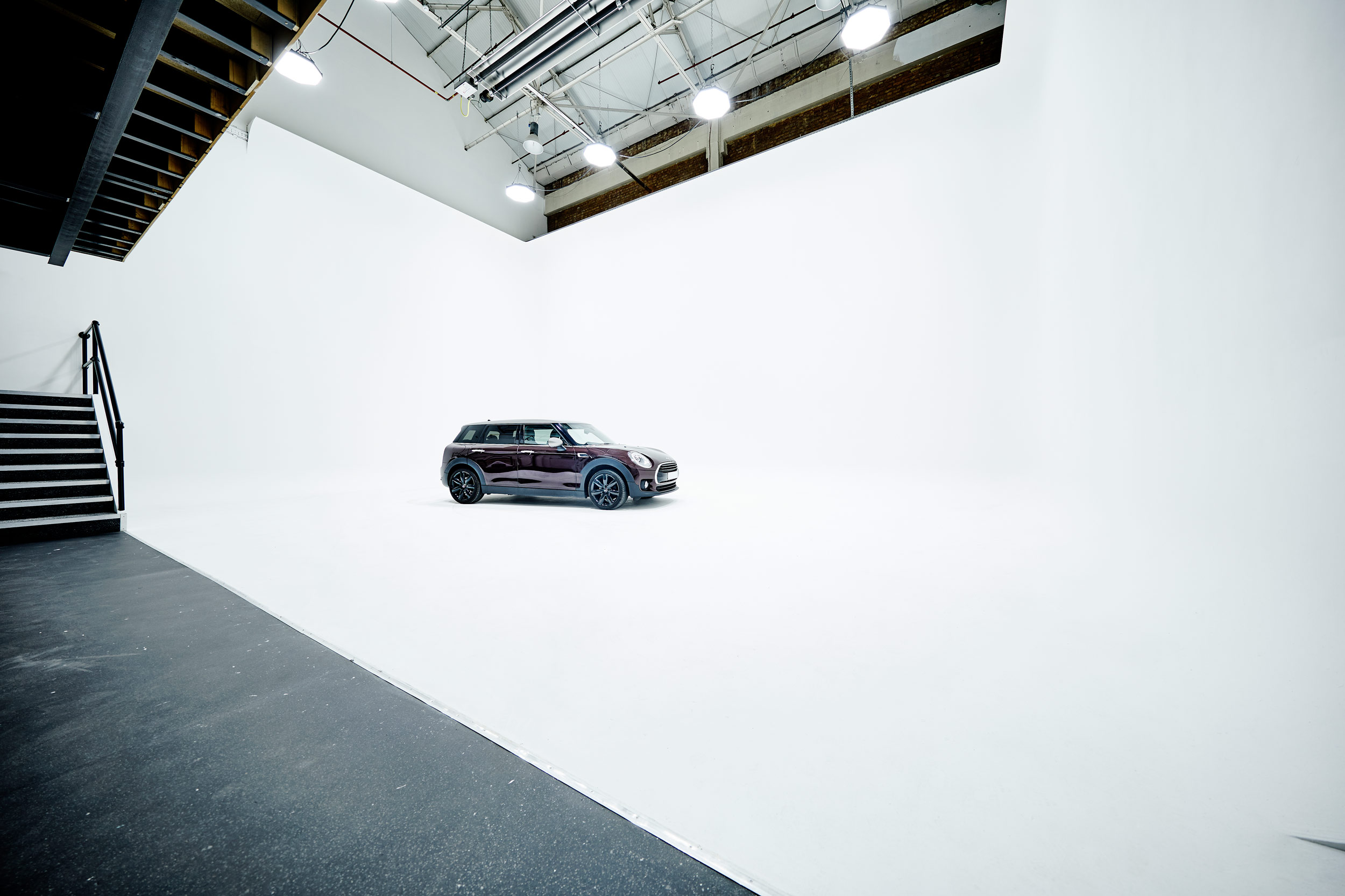 Minimalist event space at Infinity Cove, ideal for product launches and automotive showcases.