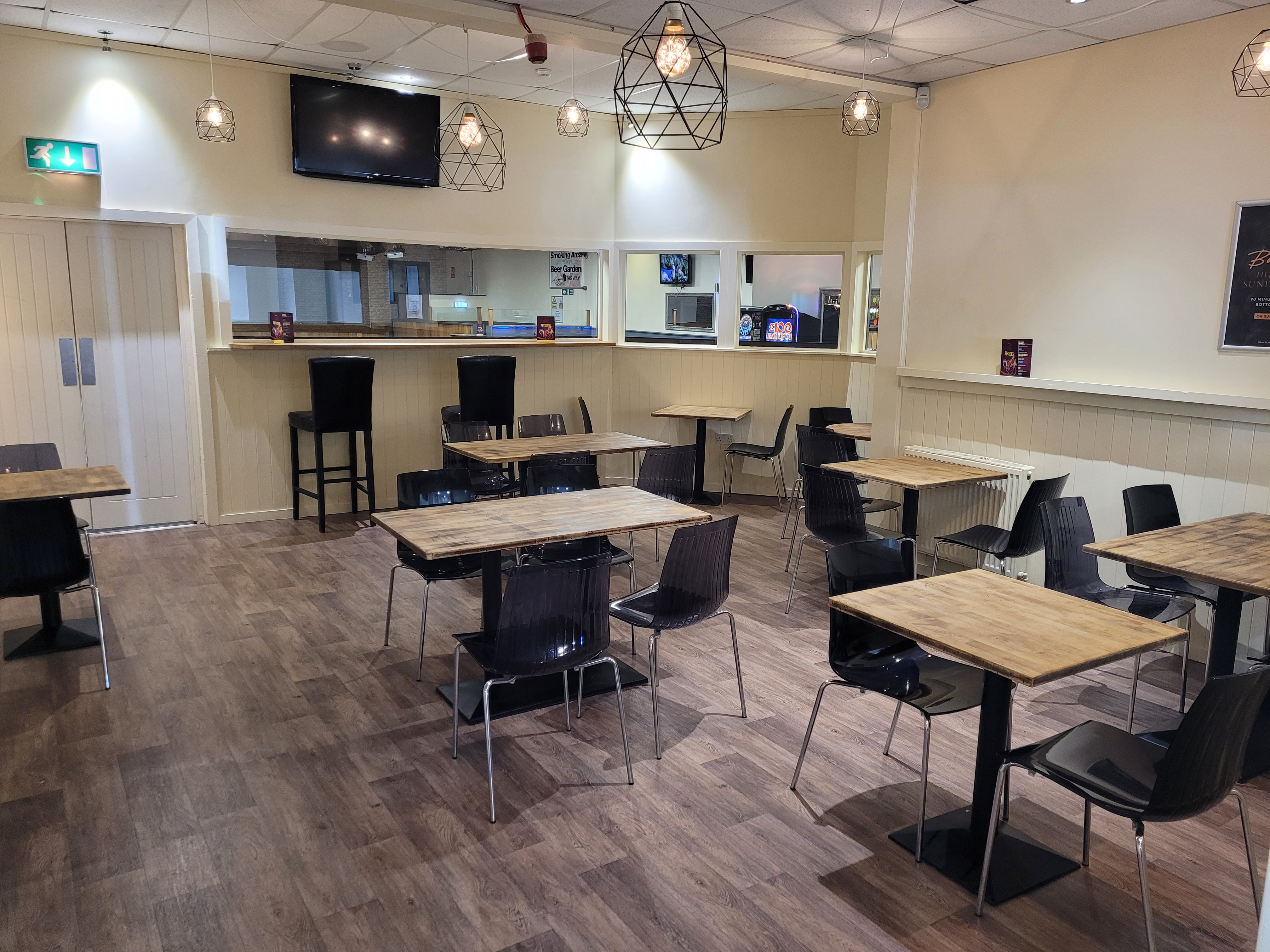 Private dining room at The New Roxy, modern design for intimate events and workshops.