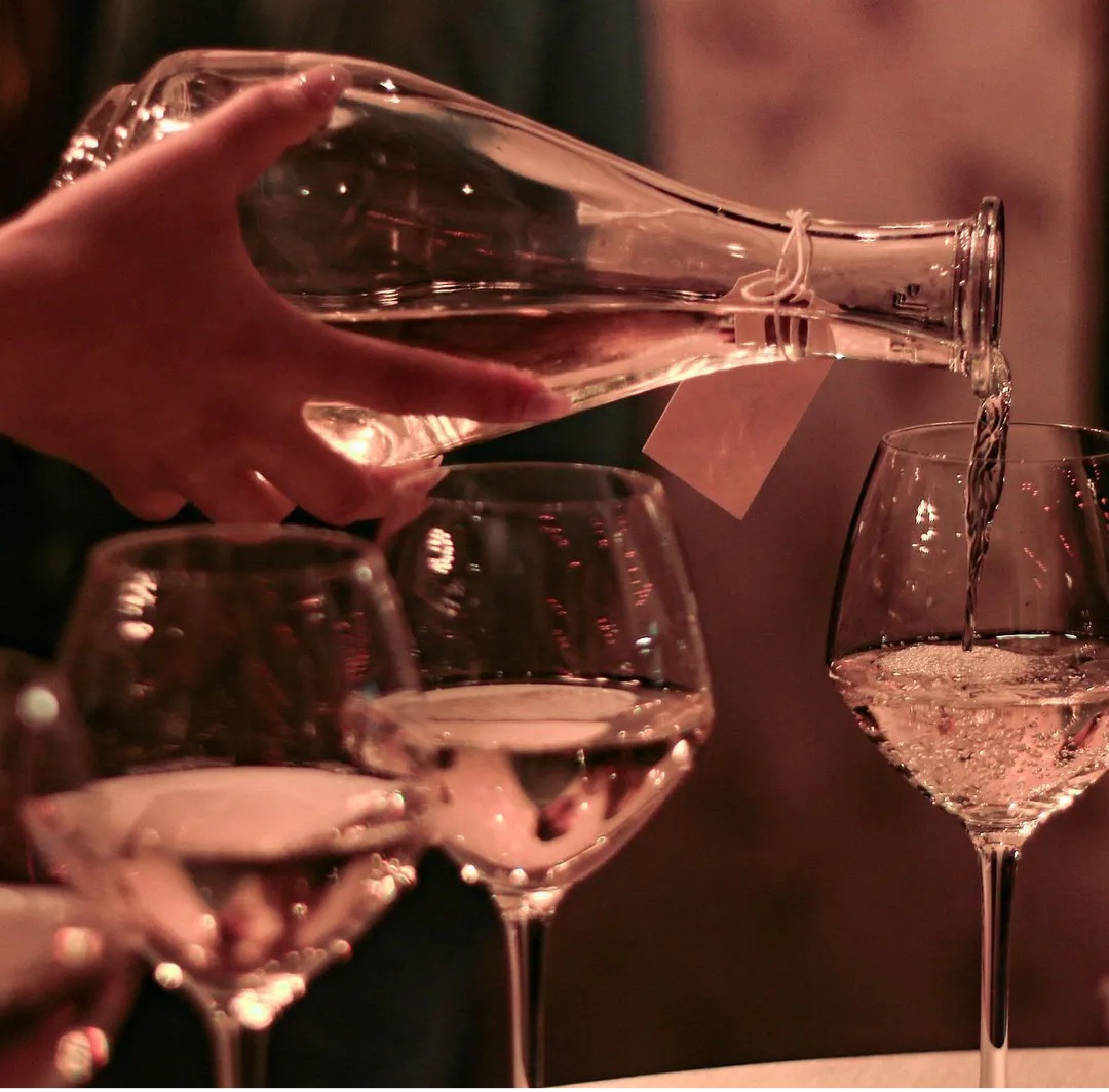 Private dining room at The New Roxy with elegant wine service for formal events.