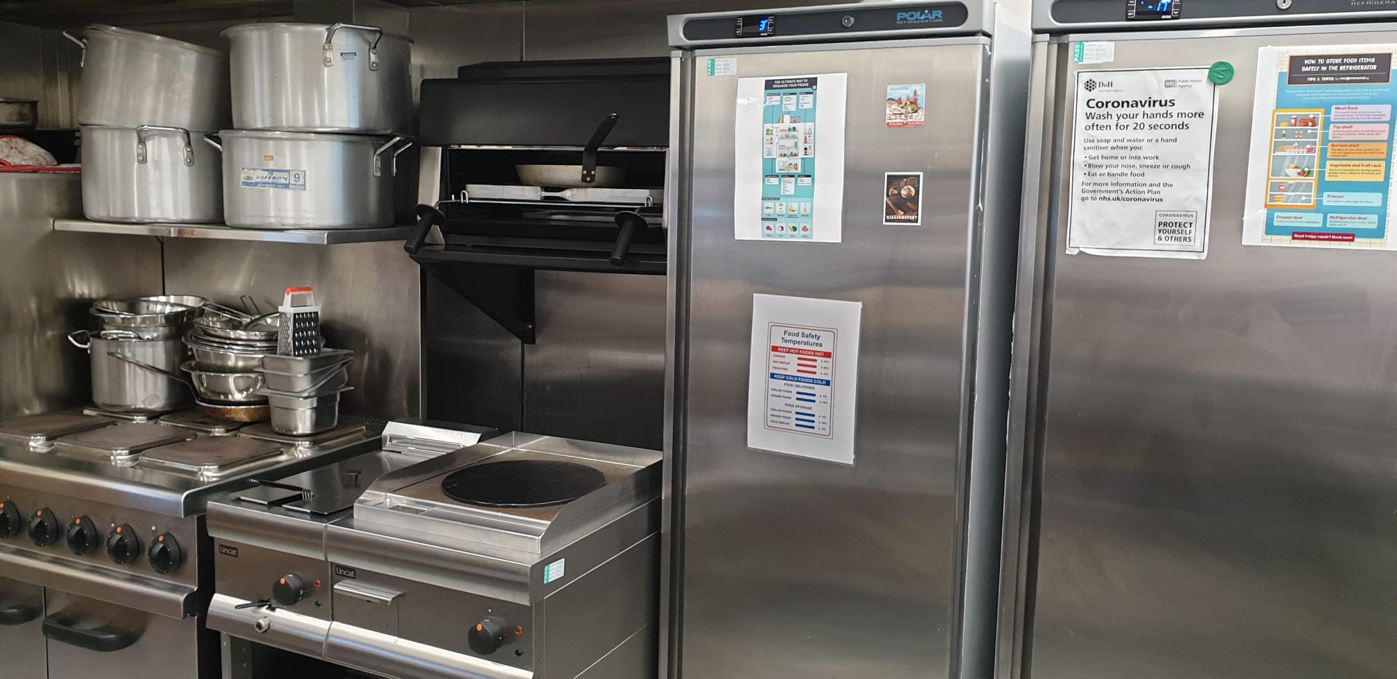 Eden Cafe Kitchen Hire: commercial kitchen with stainless steel appliances for events.