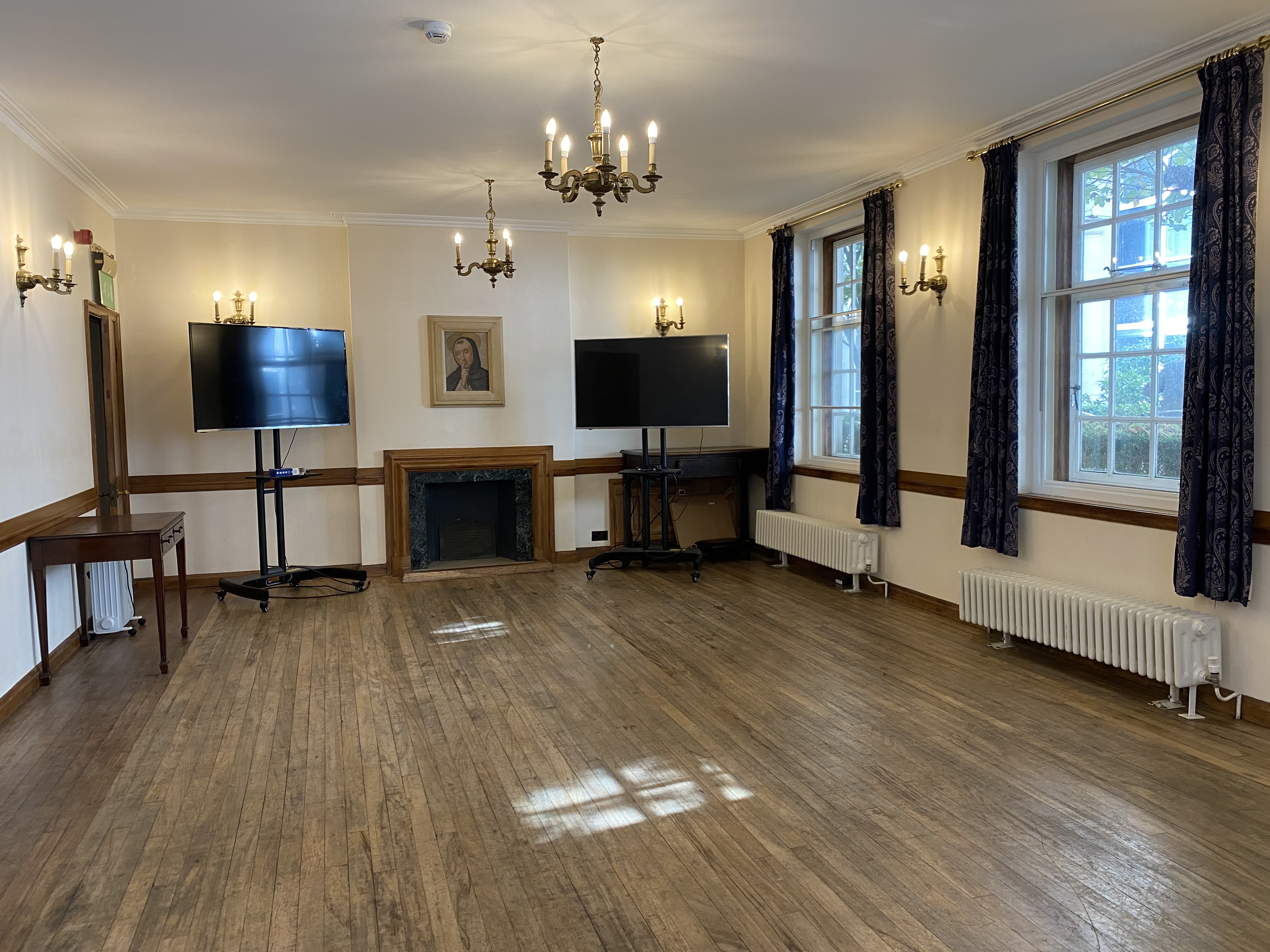 Vestry Hall meeting space with wooden flooring, ideal for corporate events and presentations.