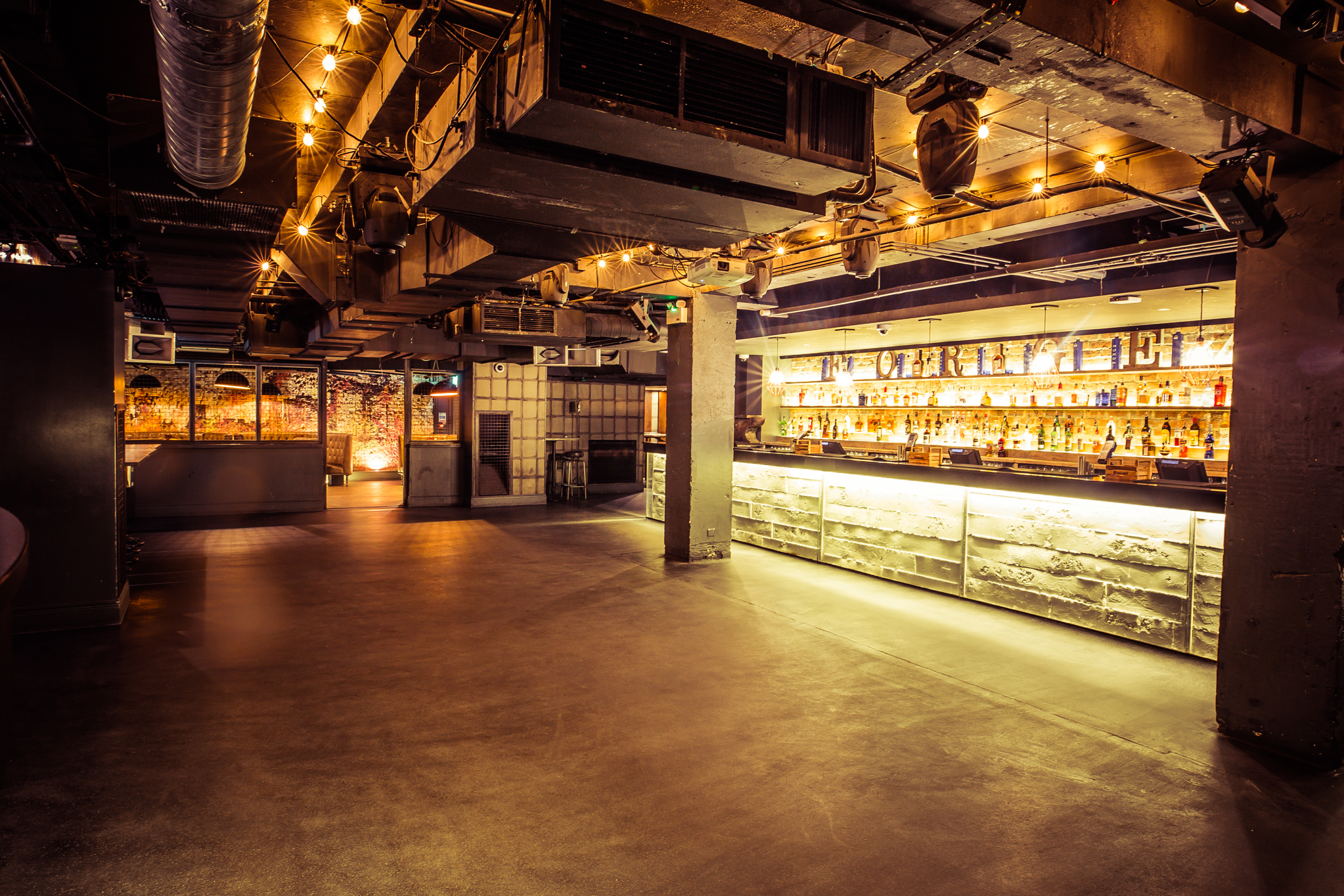 Modern venue Basement in Forge with sleek bar for intimate gatherings and events.