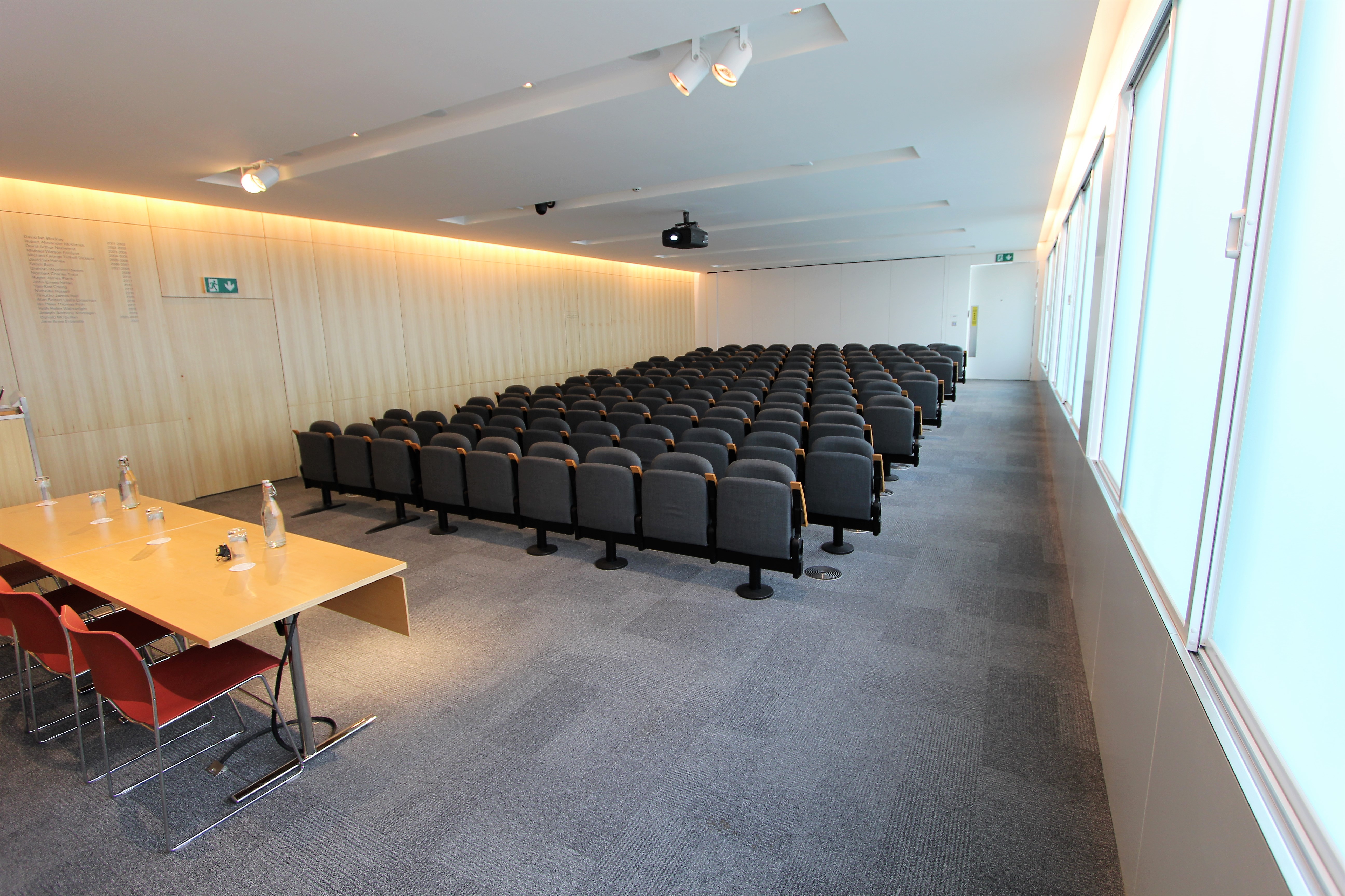 Modern conference room with seating, ideal for presentations and workshops at Bastwick St.