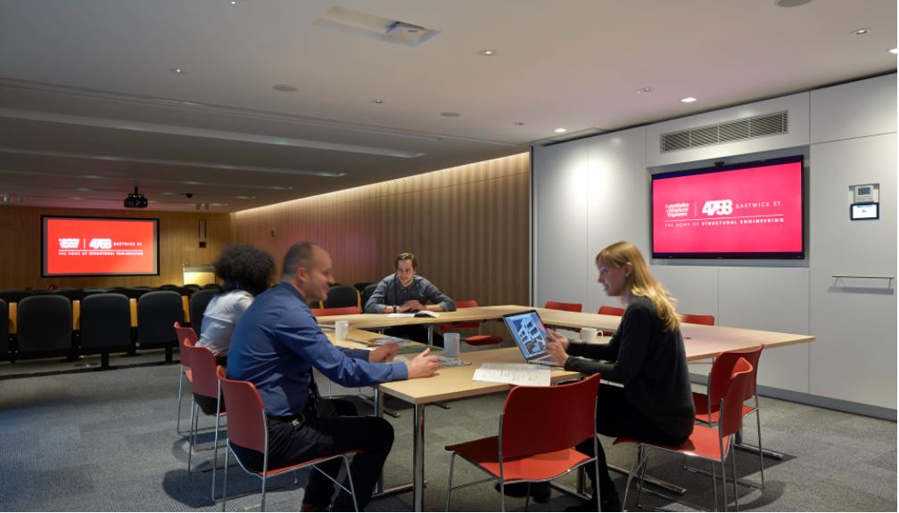 Modern meeting room at Auditorium, featuring collaborative seating for strategic planning.