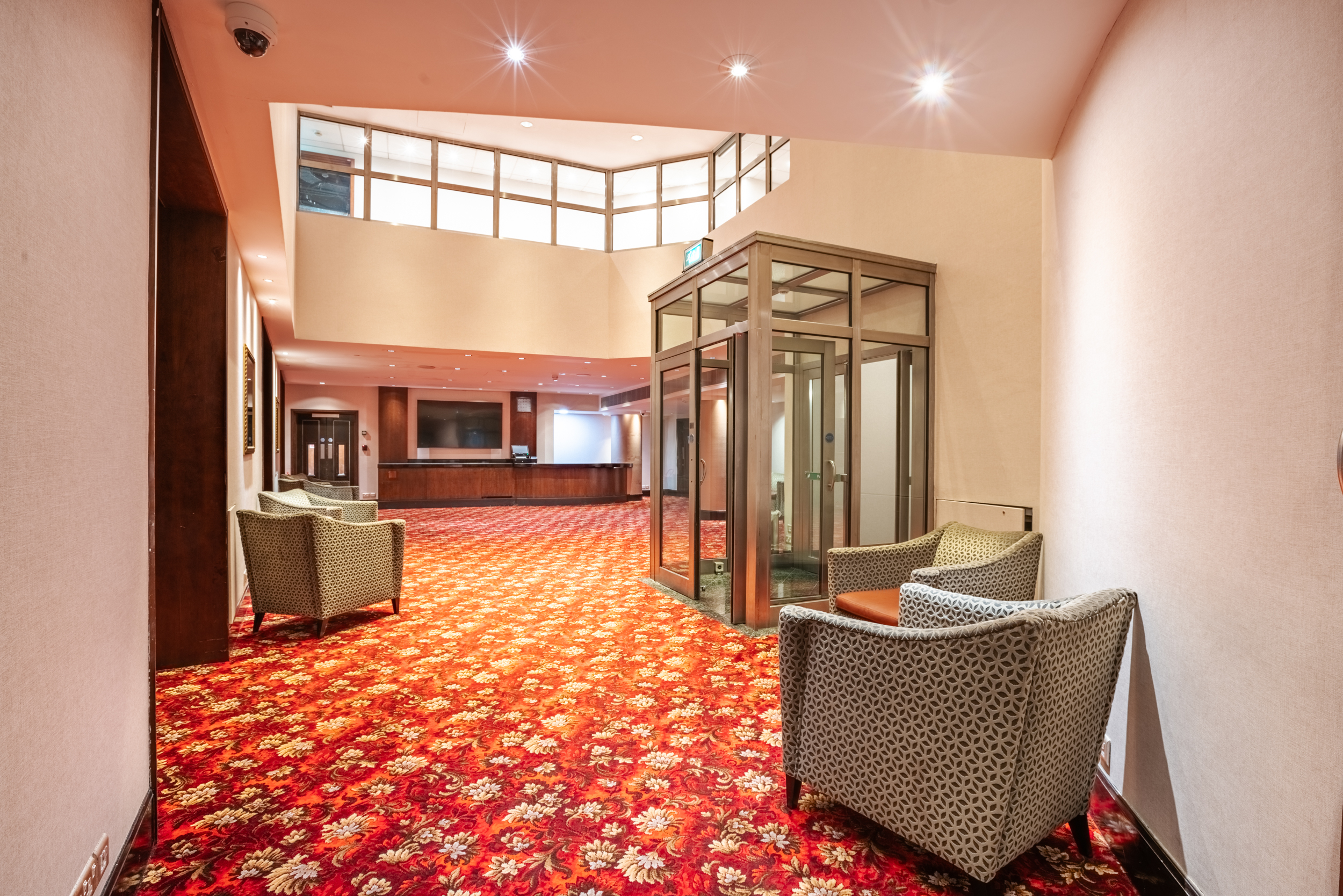 Kingdom Suite lobby at Millennium Gloucester, ideal for corporate events and networking.