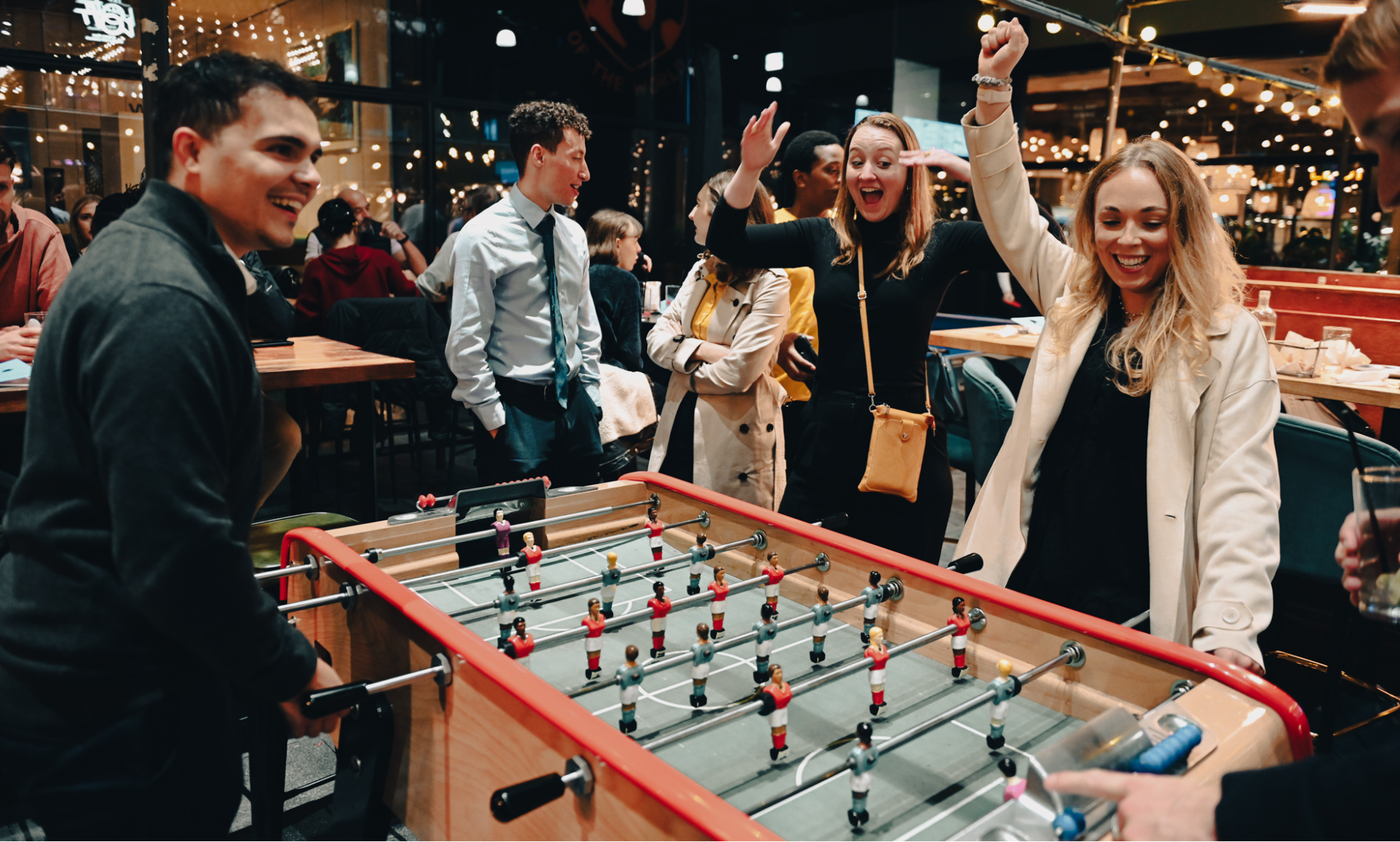 Team-building at Players Social: interactive group gaming for corporate event networking.