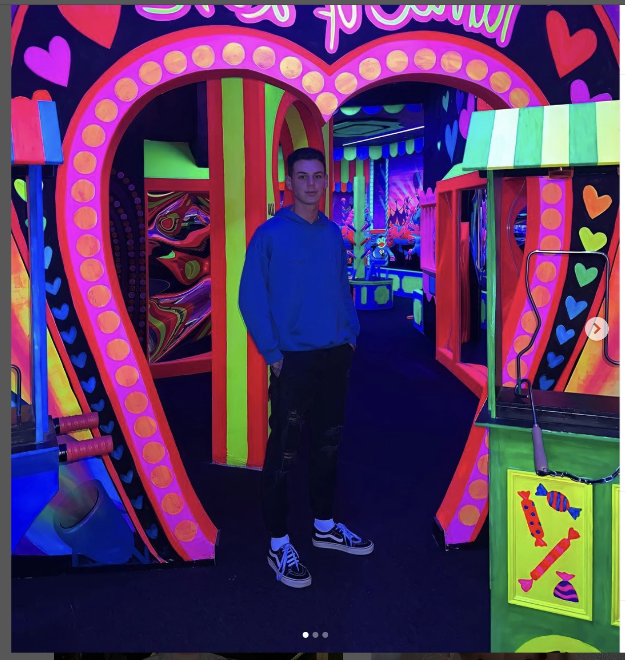 Vibrant neon-lit event space with heart-shaped entrance for themed parties and immersive experiences.