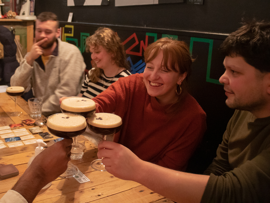 Lively networking event at Replay Bristol with attendees enjoying drinks and conversation.