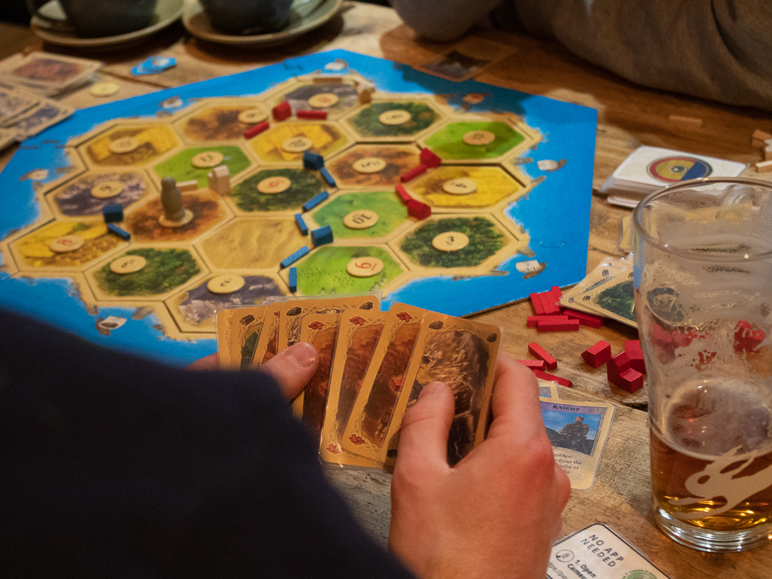 Vibrant tabletop gaming session at Replay Bristol for team-building and networking events.