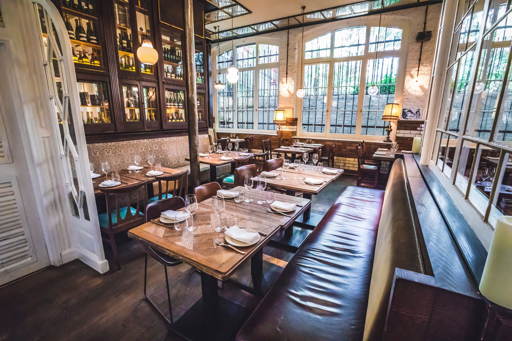 Stylish Ibérica Farringdon restaurant with warm lighting, ideal for corporate meetings and dinners.