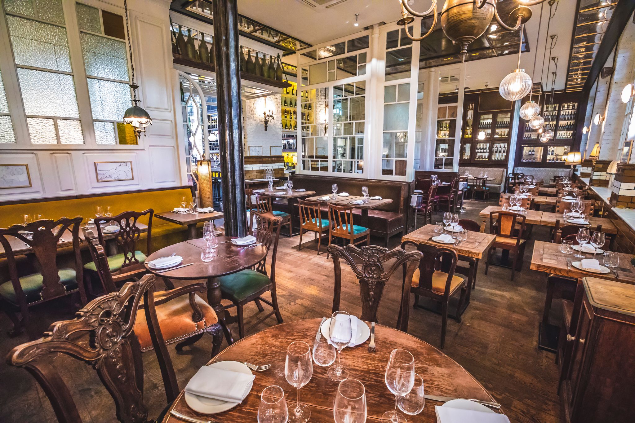 Stylish Ibérica Farringdon restaurant with warm lighting for corporate dinners and gatherings.