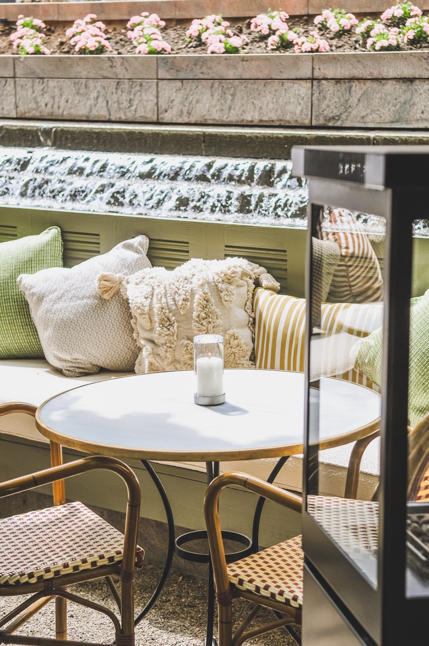 Cozy seating area with plush pillows at La Terrazza for informal gatherings and events.